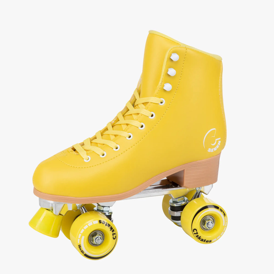 Yellow roller skate with brown soles on a white background