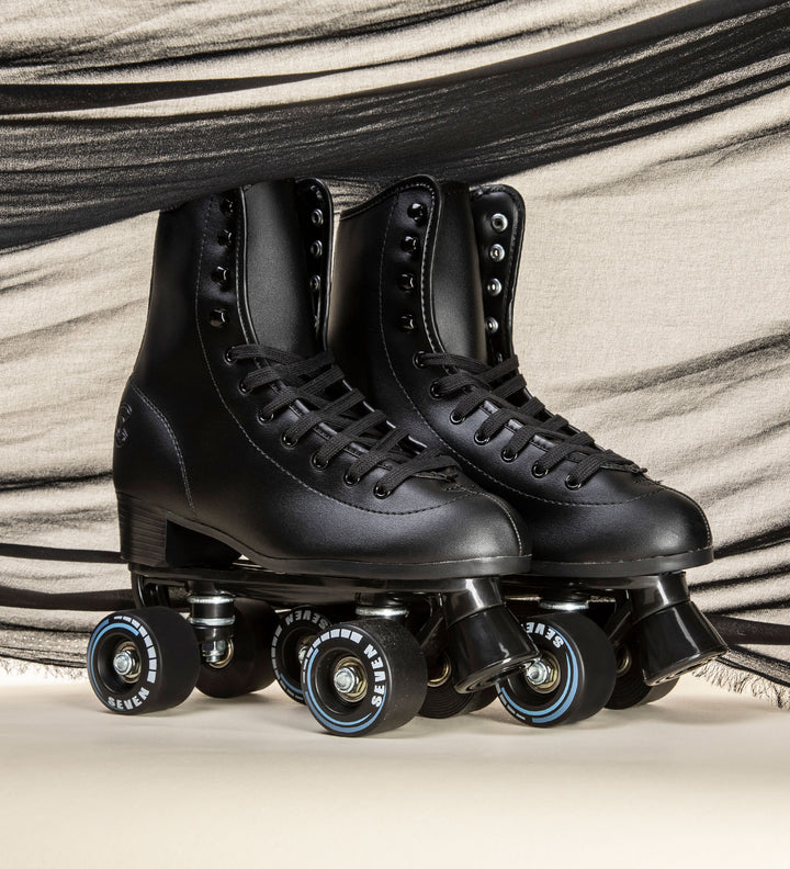 Black quad roller skates