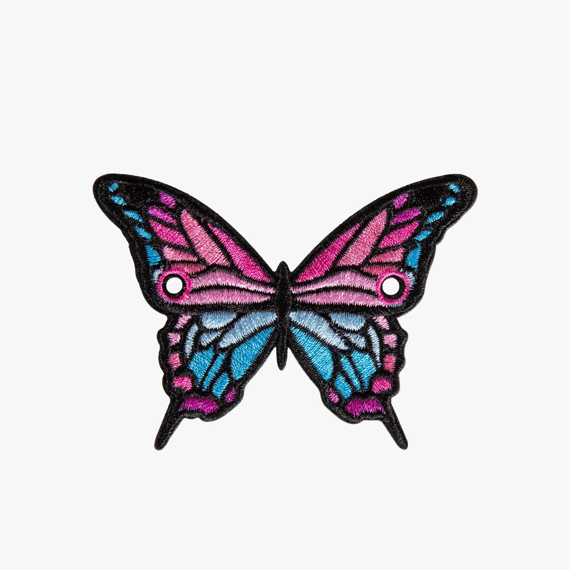 Butterfly charm with pink and blue wings on a white background