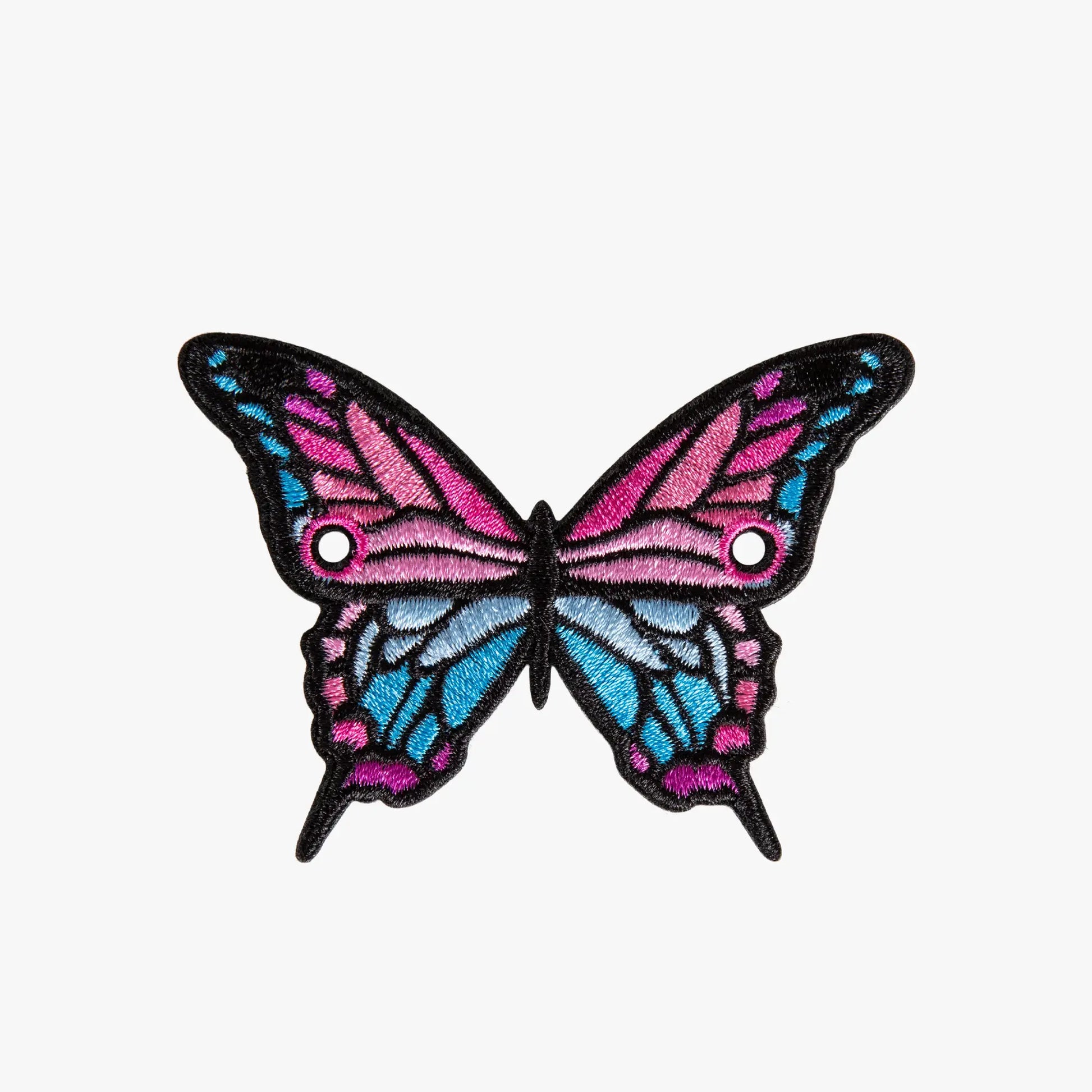 Butterfly charm with pink and blue wings on a white background