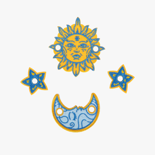 Decorative sun, moon, and star charm set