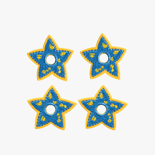 Four blue star-shaped charms. Space Blue Celestial Star Mini Charms