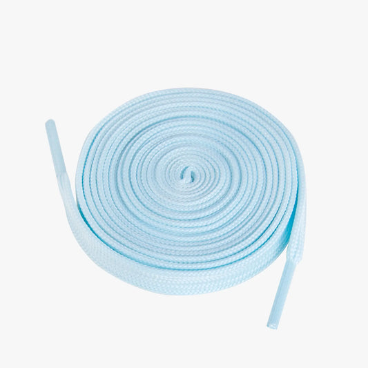 Light blue shoelaces coiled on a white background