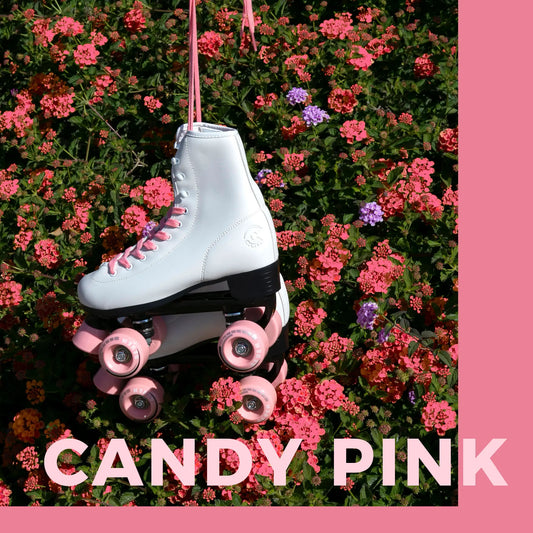 White roller skate with pink wheels hanging among flowers, 'CANDY PINK' text below.