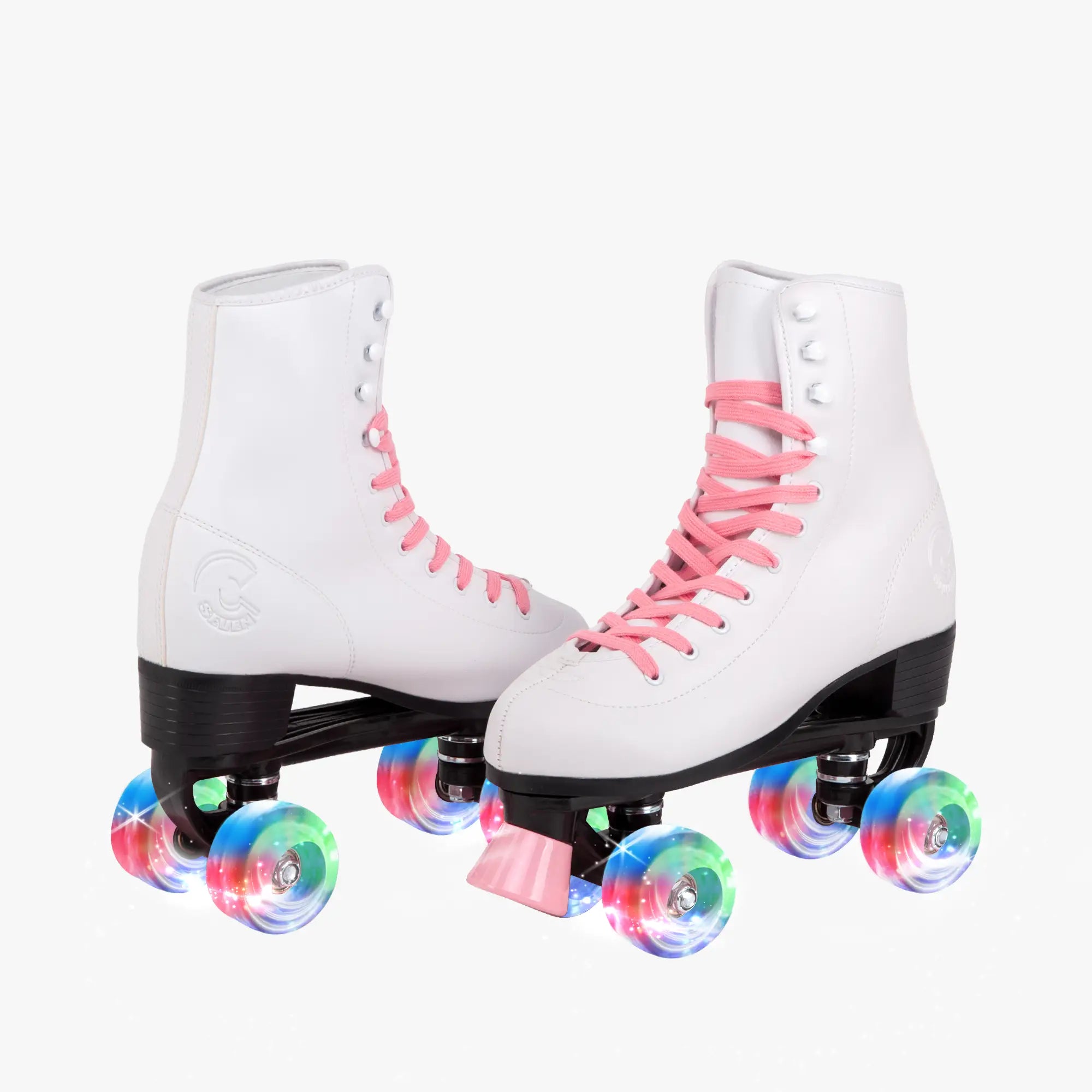 White roller skates with pink laces and colorful wheels on a white background