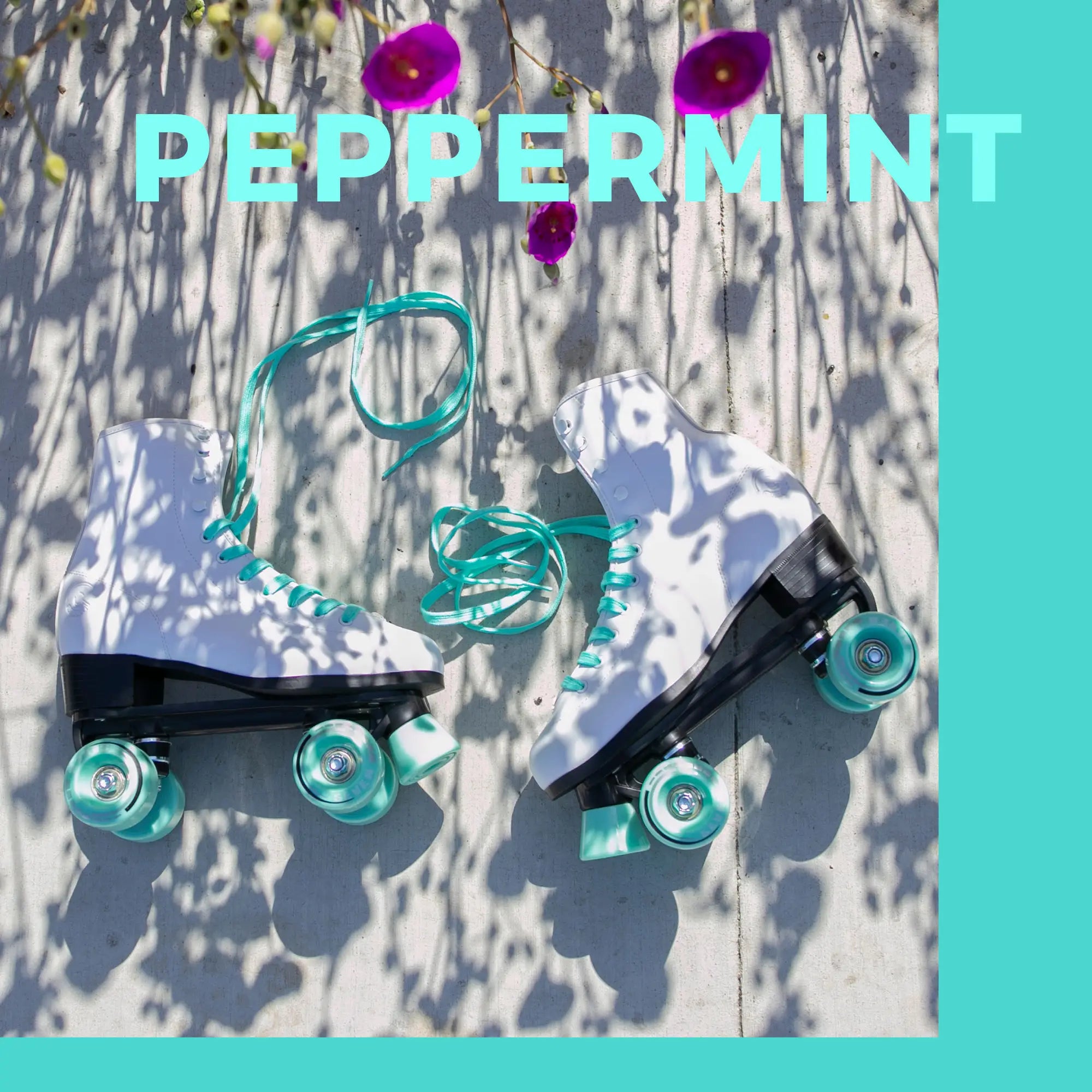 Pair of roller skates with teal wheels on a textured surface with flowers and 'PEPPERMINT' text.