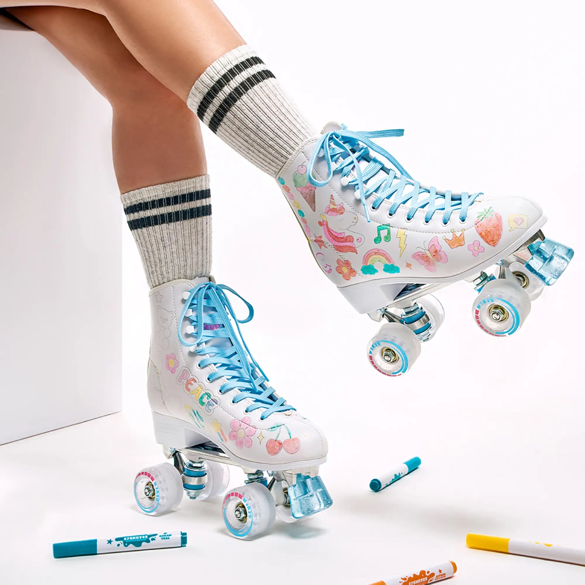Roller skates with colorful designs on a white background