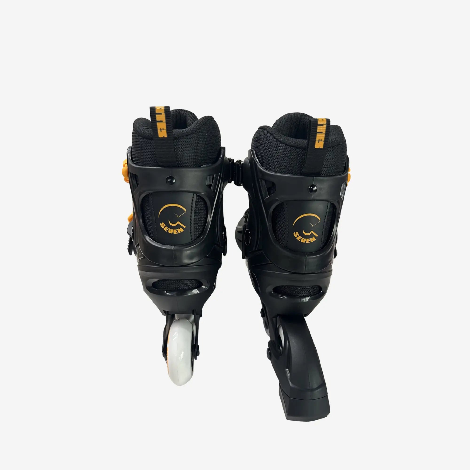 Black inline skates with white wheels on a white background