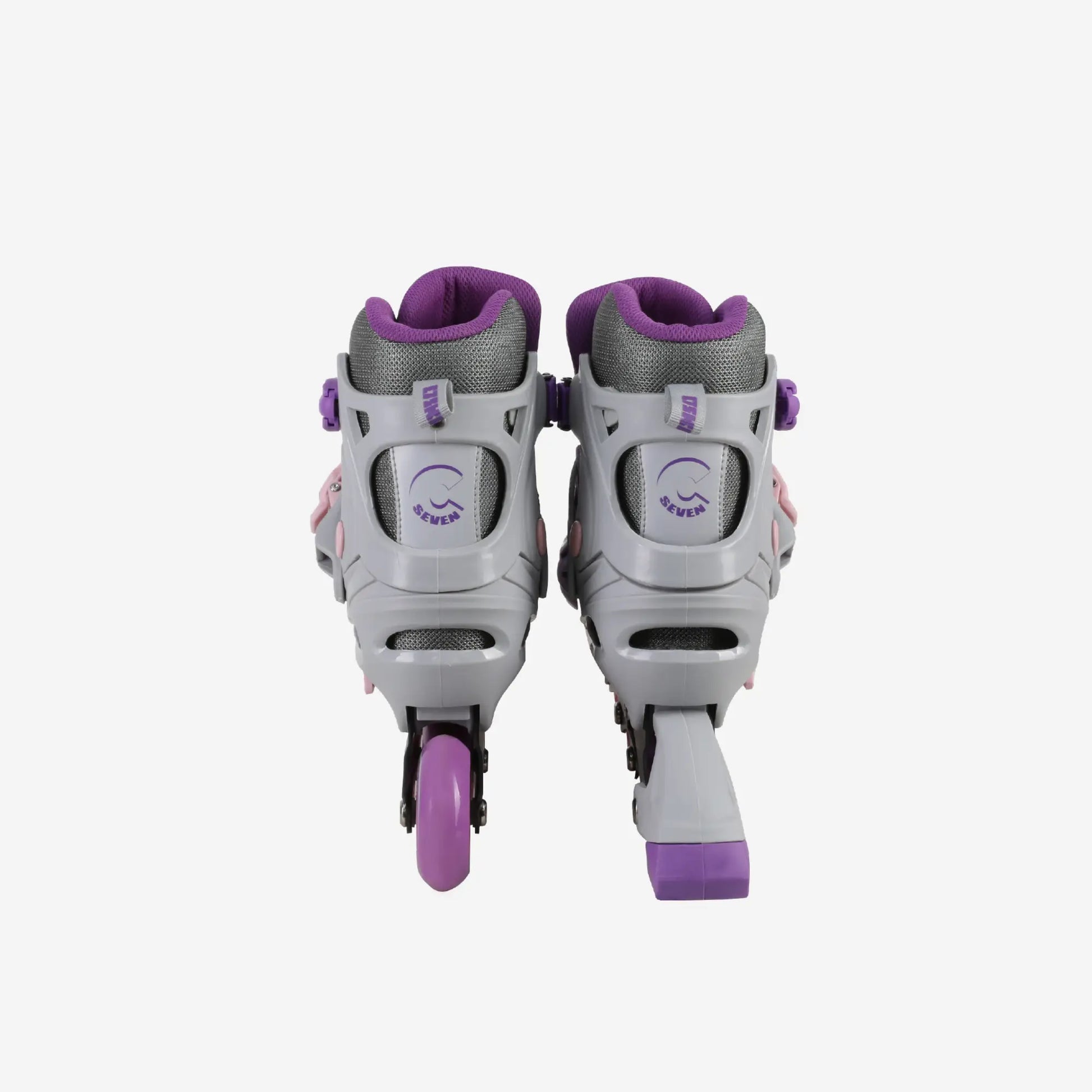 Pair of gray and purple roller skates on a white background