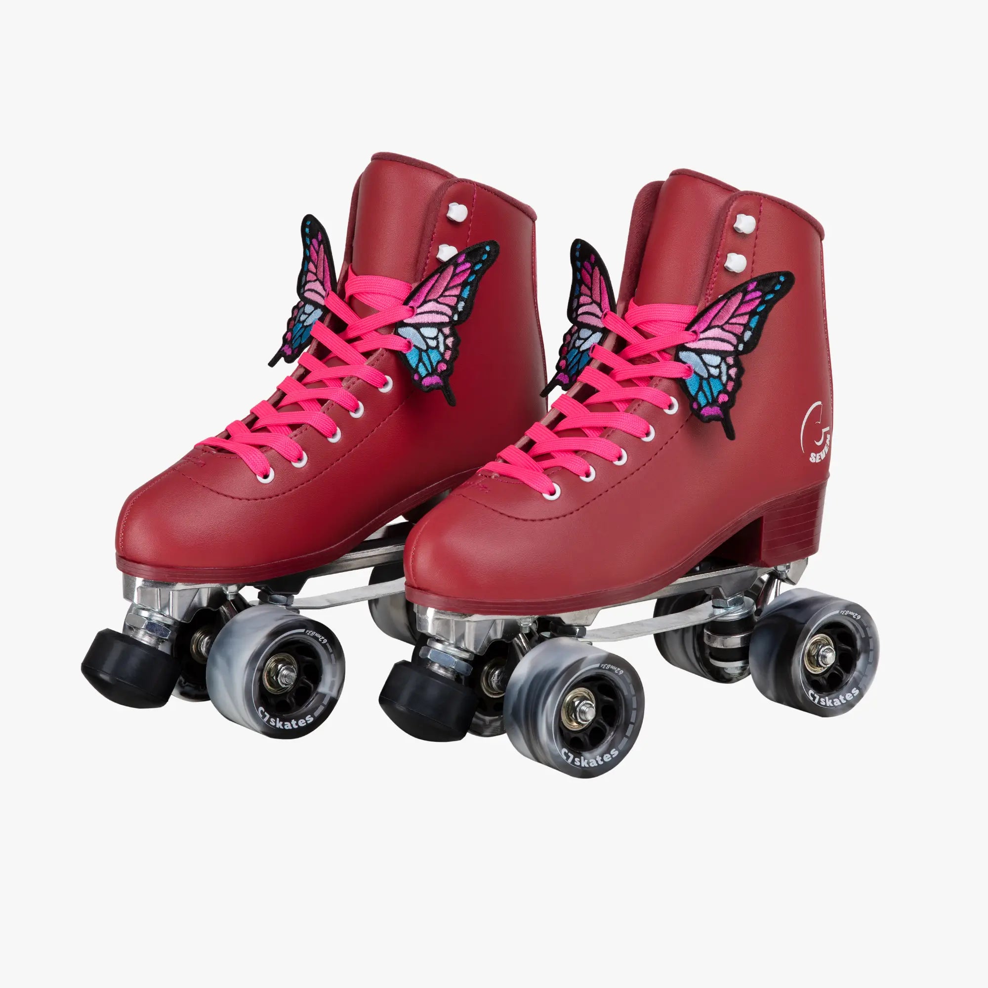 Red roller skates with pink butterfly designs on a white background