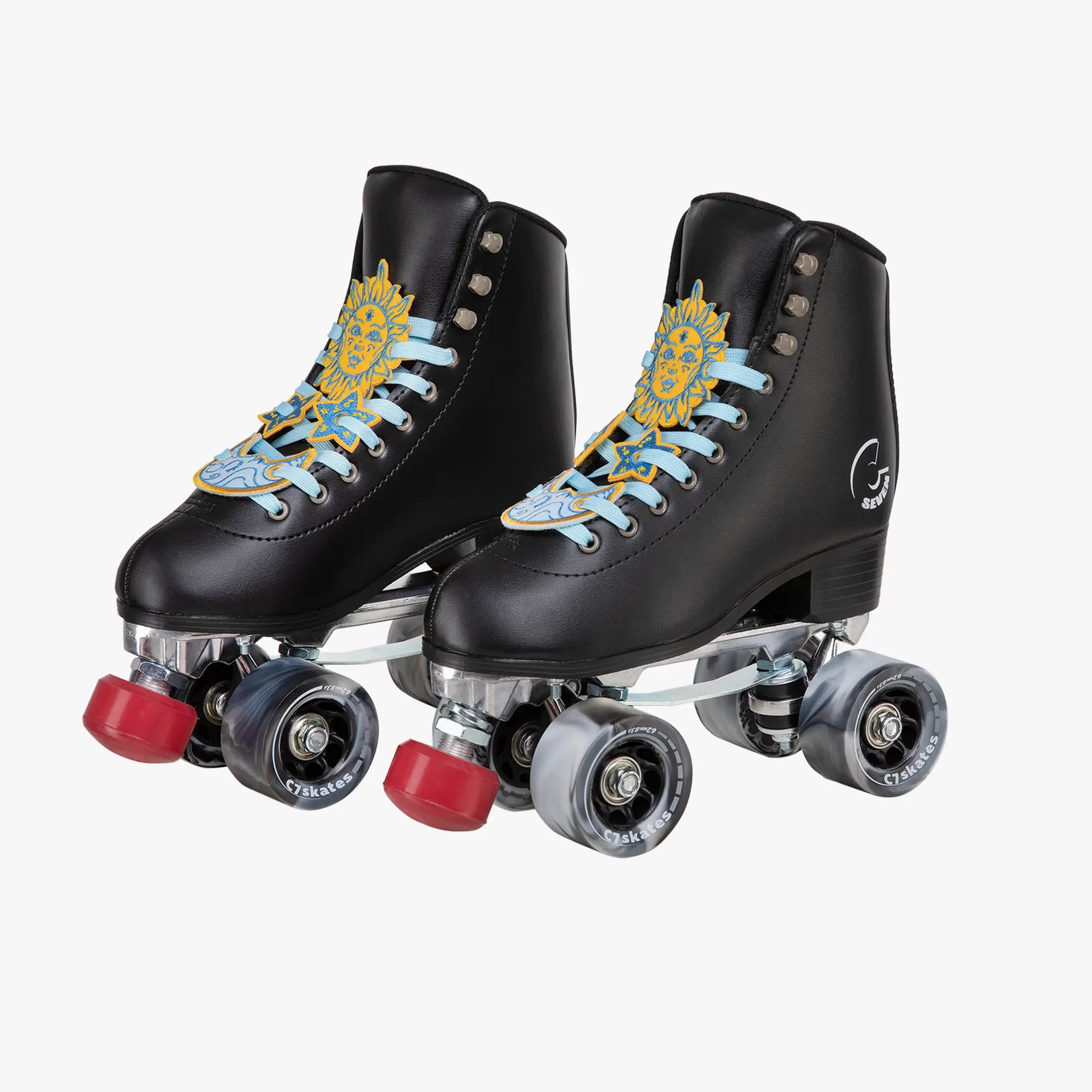 Pair of black roller skates with decorative laces on a white background