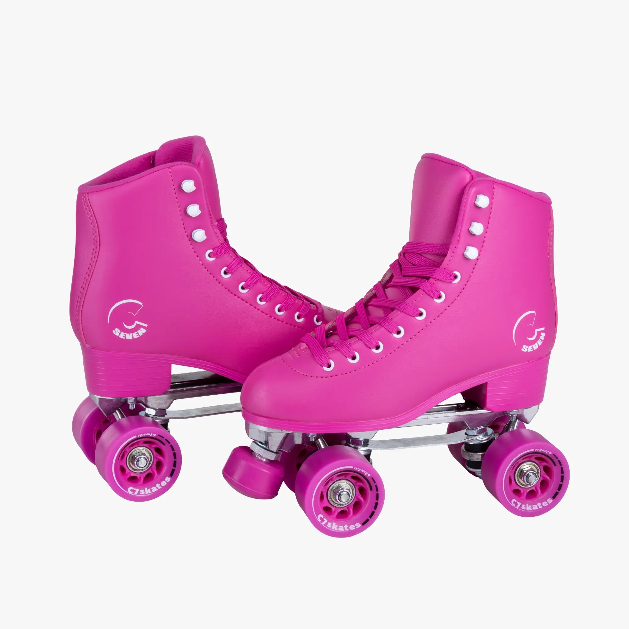 Pair of pink roller skates with visible brand logo on a white background