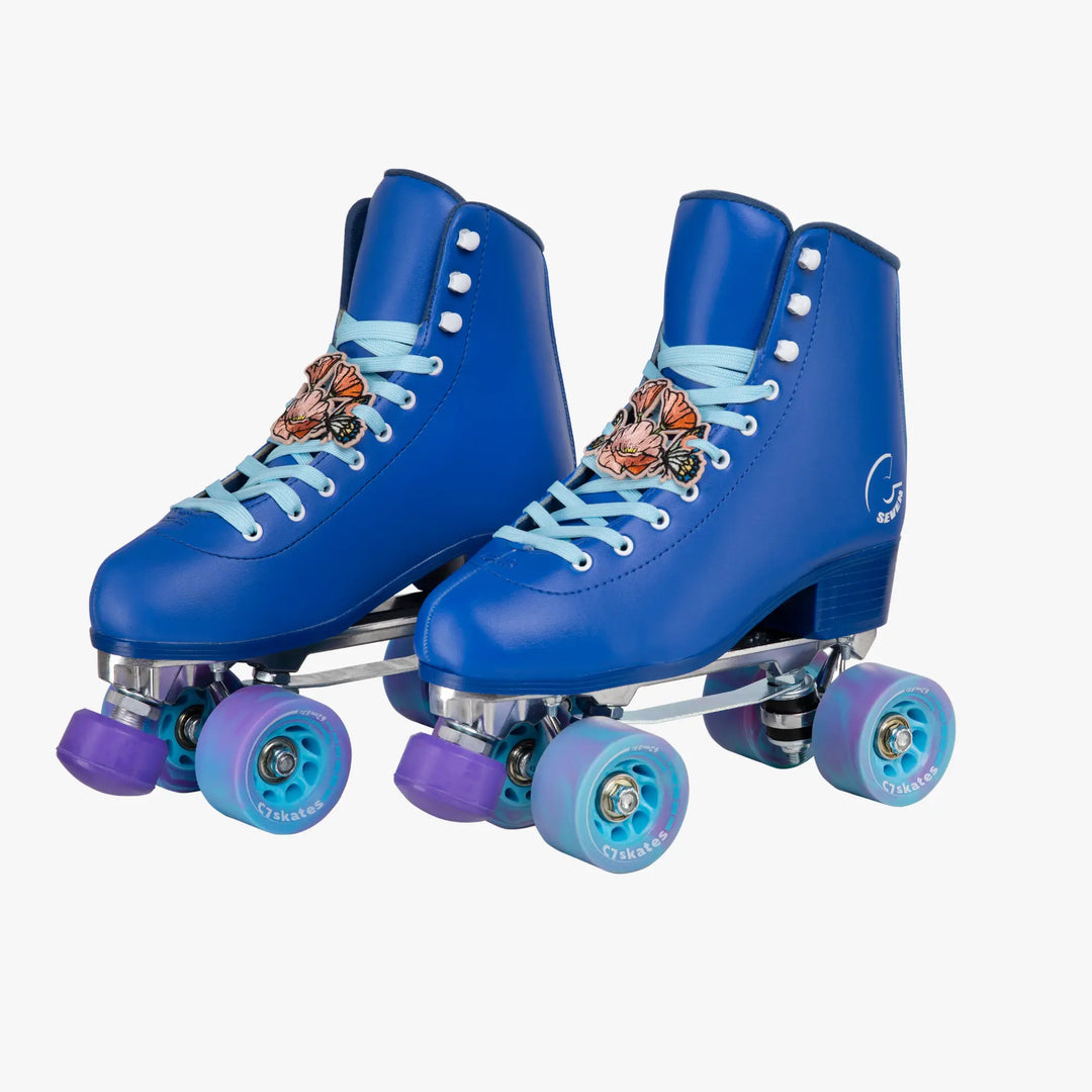 Blue roller skates with purple wheels on a white background