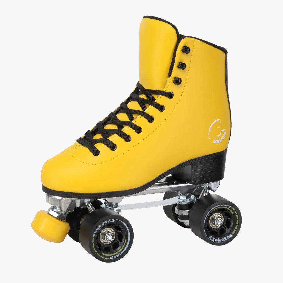 Yellow roller skate with black laces on a white background