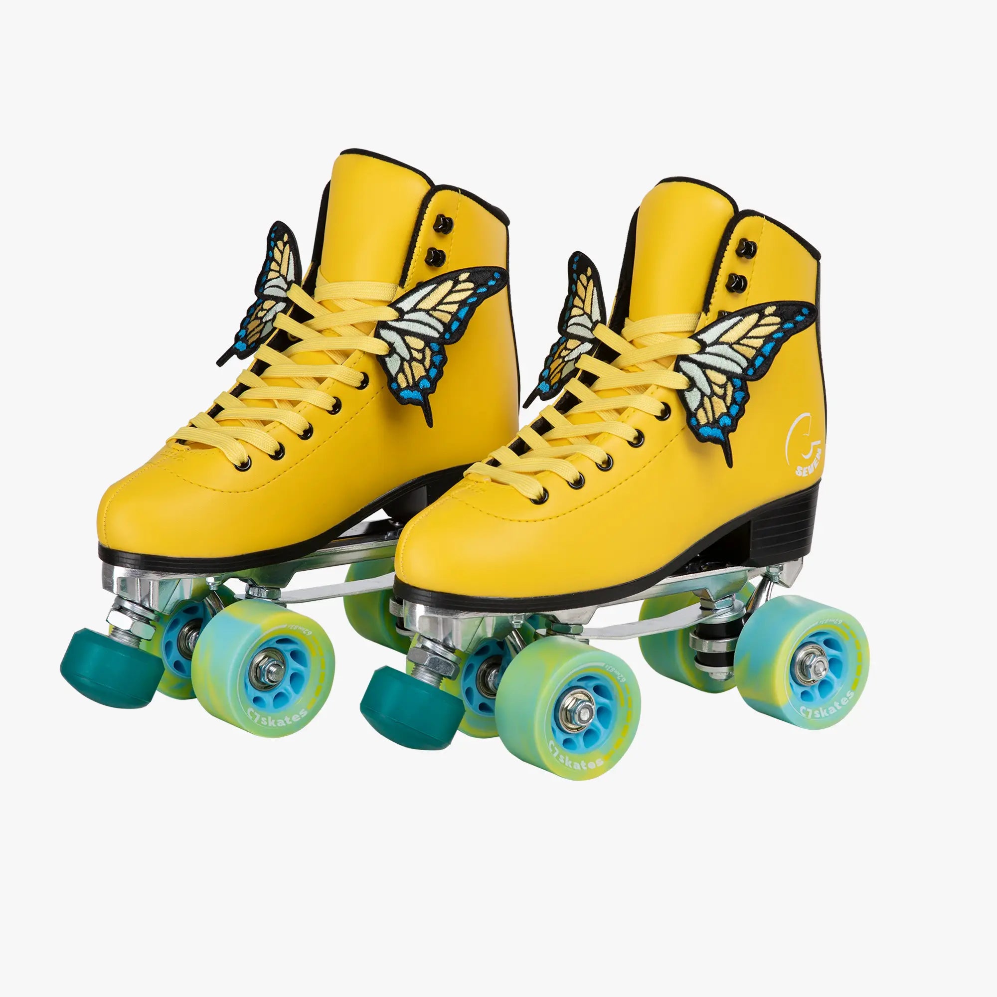 Yellow roller skates with butterfly designs on a white background