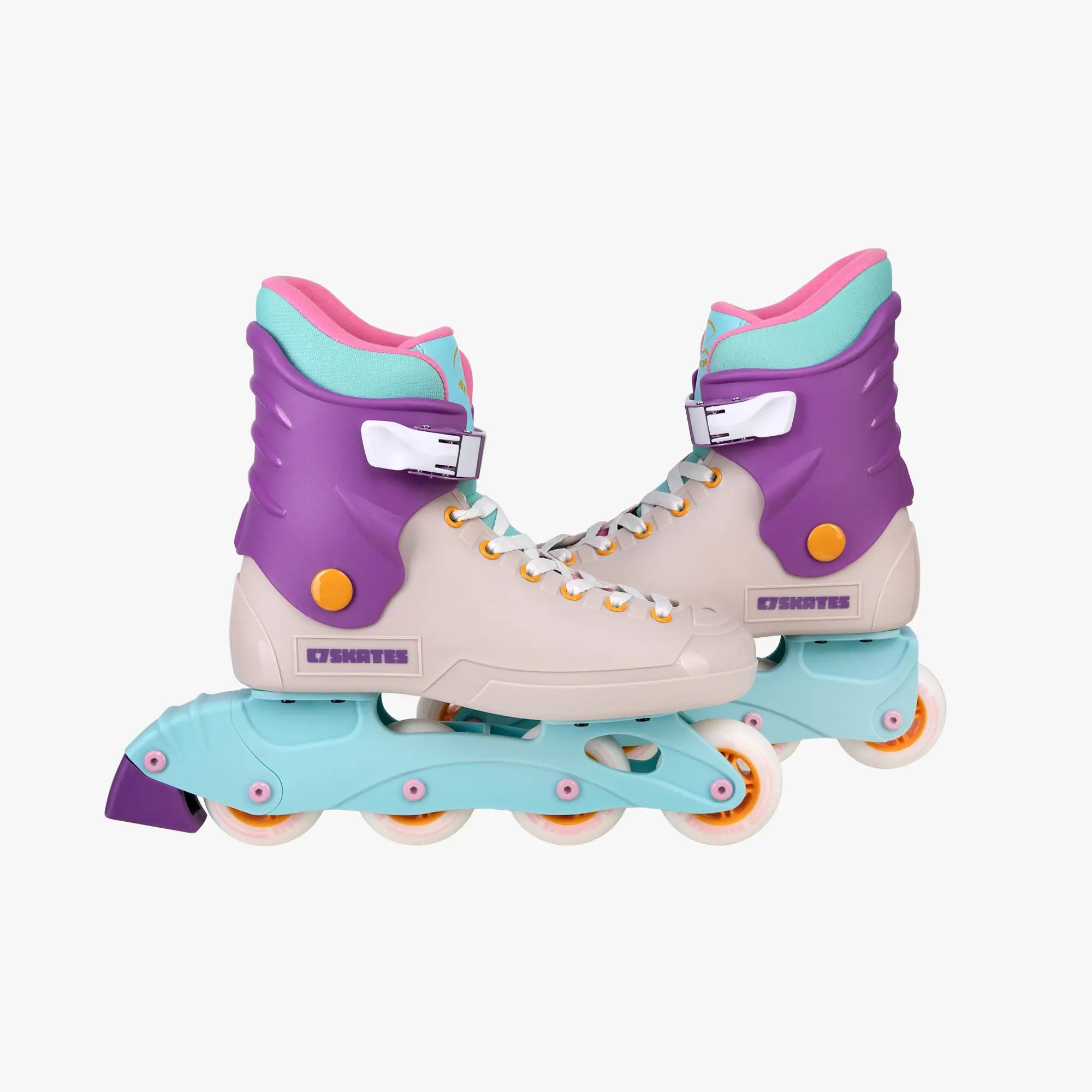 Pair of roller skates with purple and pink top sections on a white background