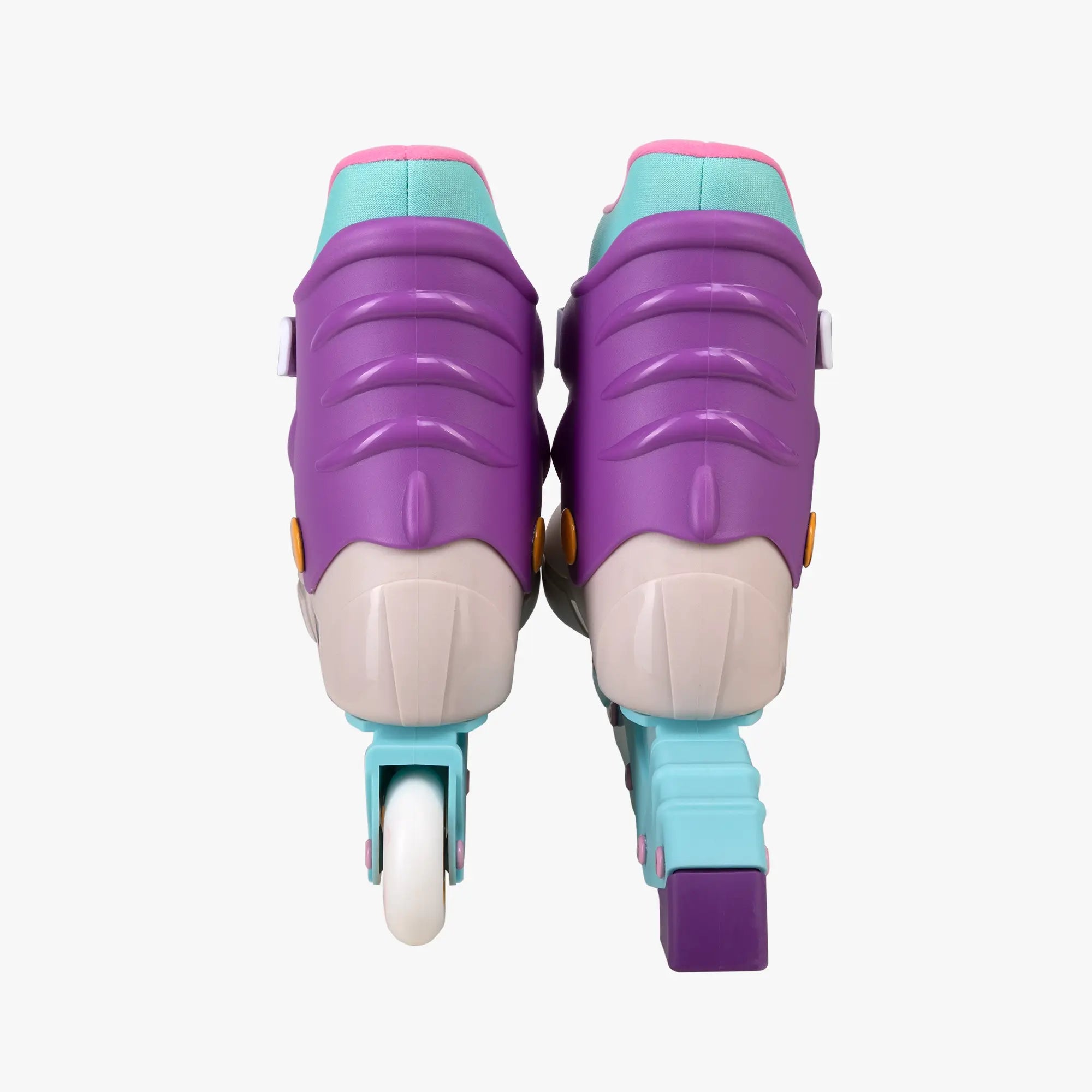 Pair of purple and teal roller skates on a white background