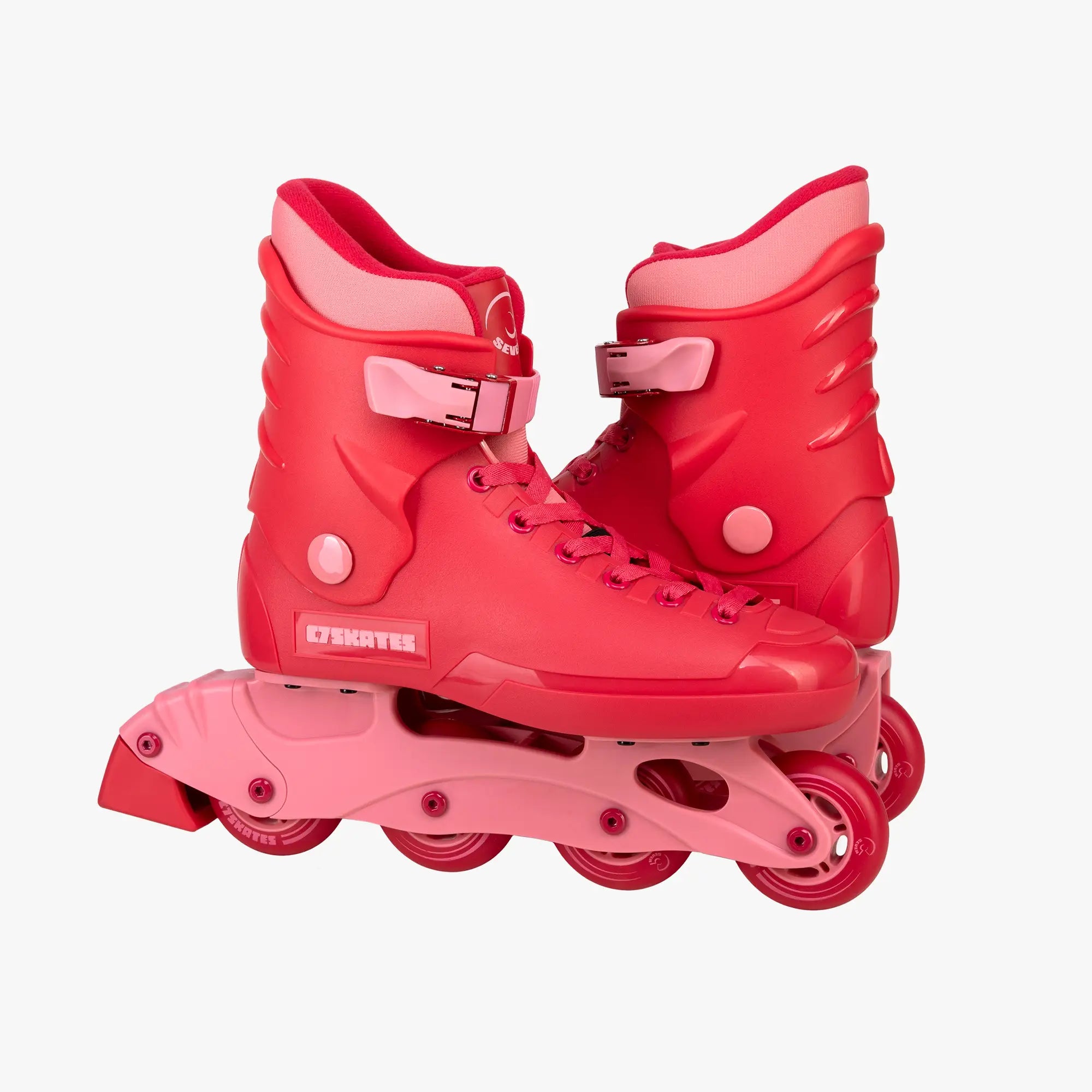 Red inline skates with pink accents on a white background