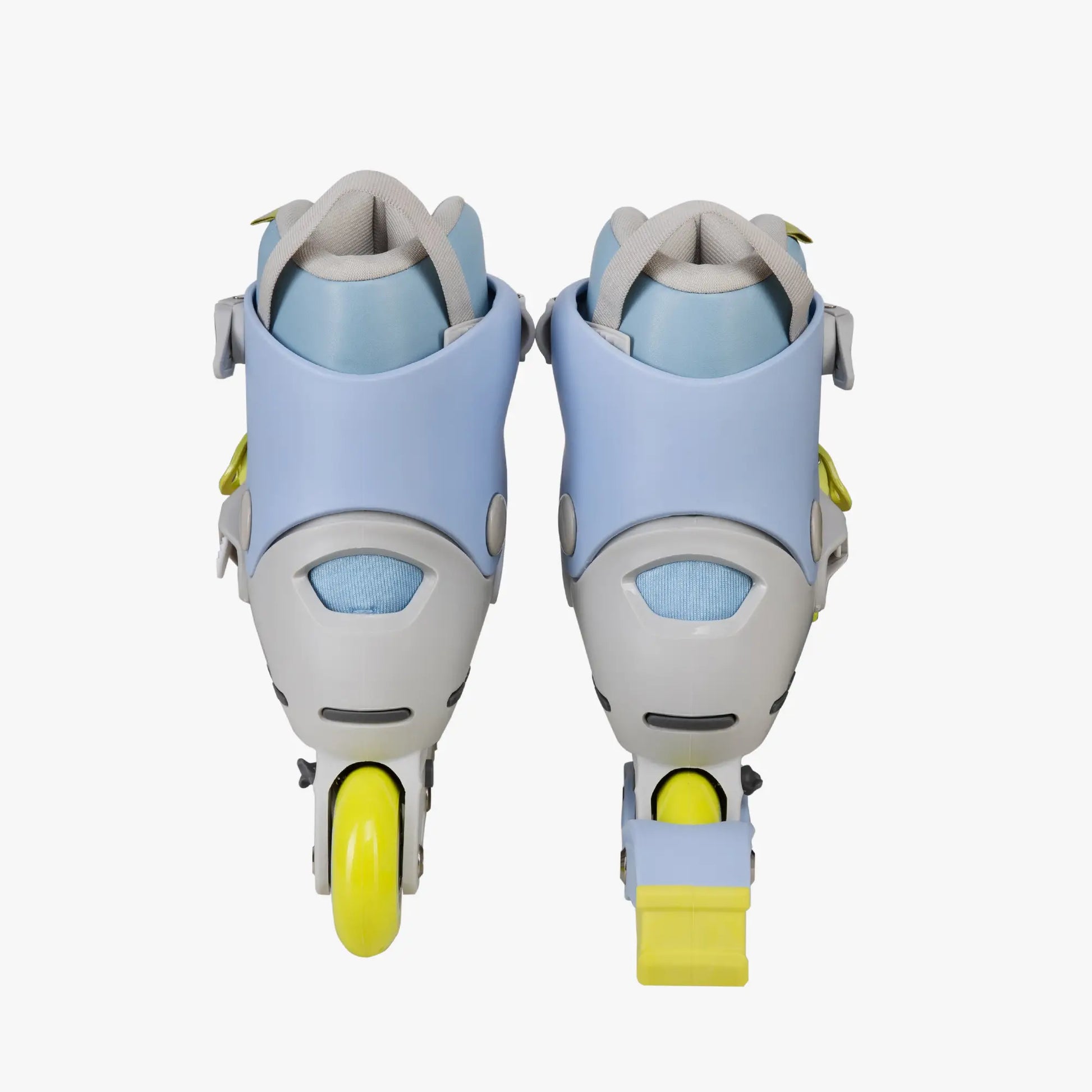 Pair of light blue and gray roller skates with yellow wheels on a white background