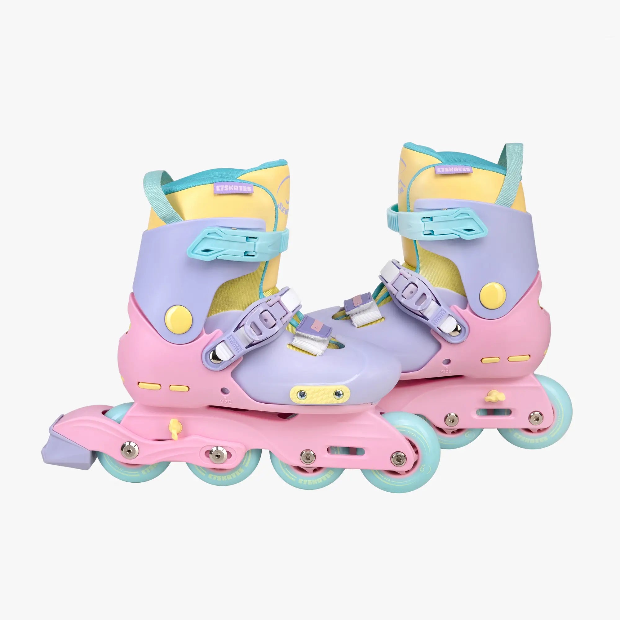 Pastel-colored inline skates on a white background