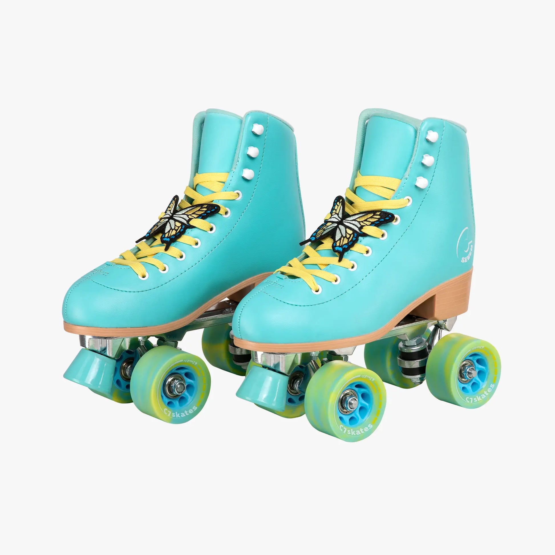 Turquoise roller skates with yellow laces on a white background