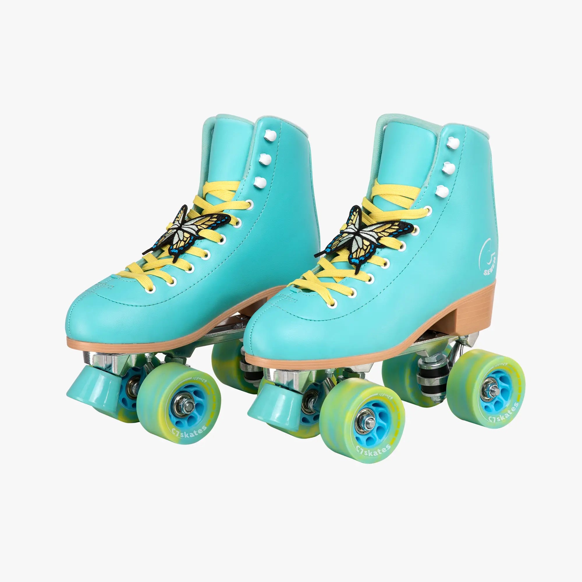 Turquoise roller skates with yellow laces on a white background