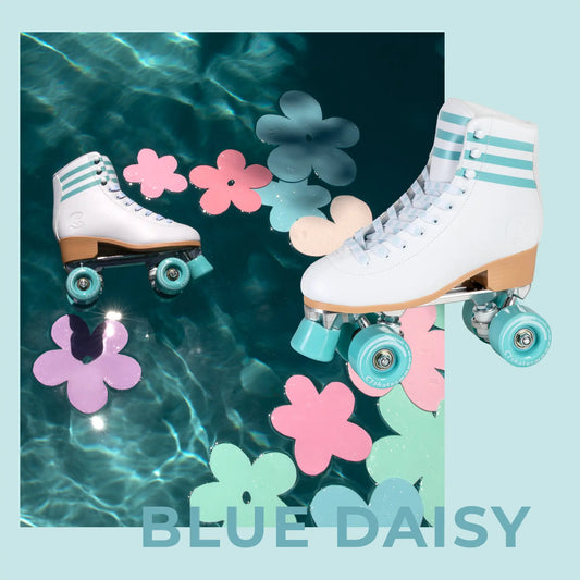 White roller skates with turquoise wheels on a blue background with floral decorations.