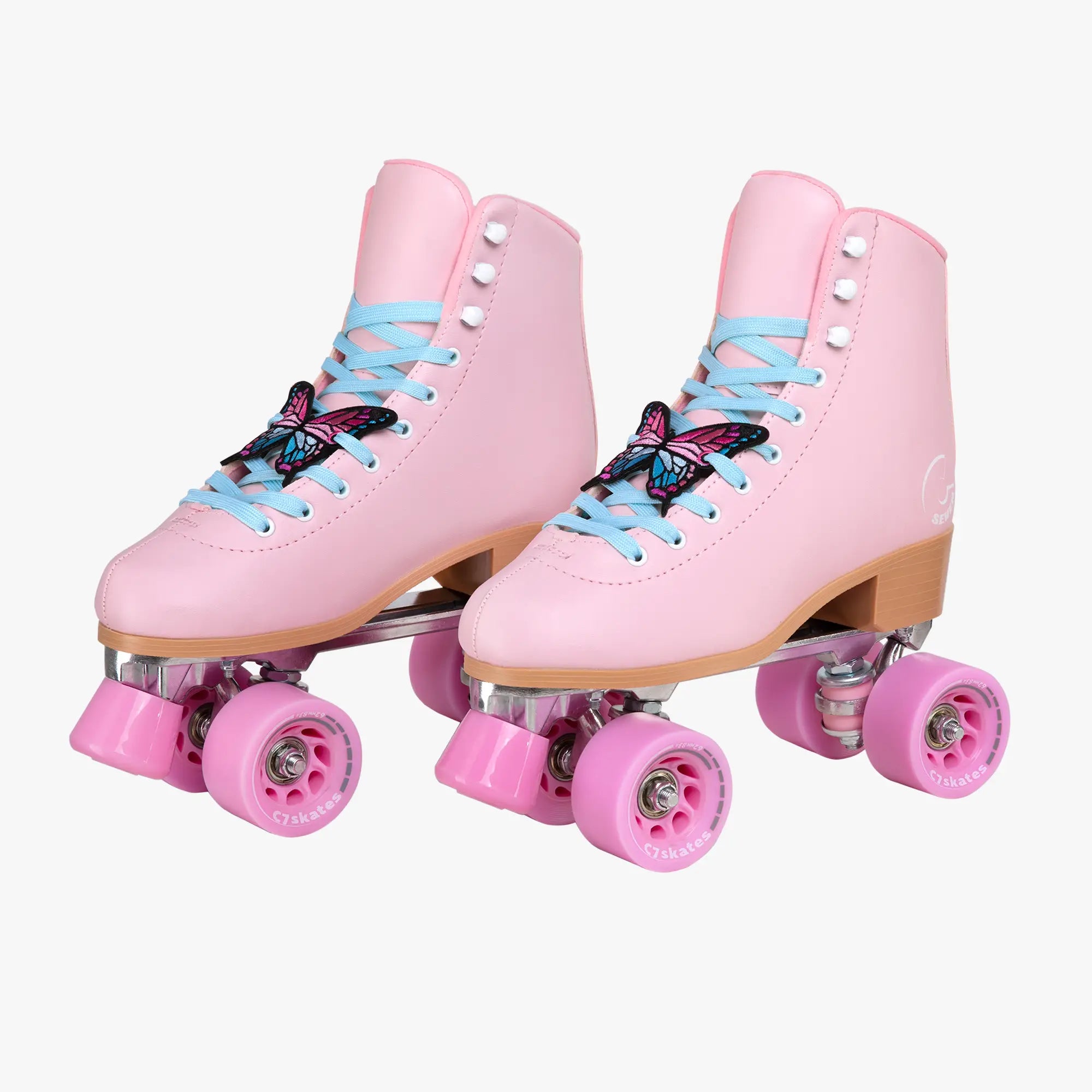 Pink roller skates with butterfly decorations on a white background