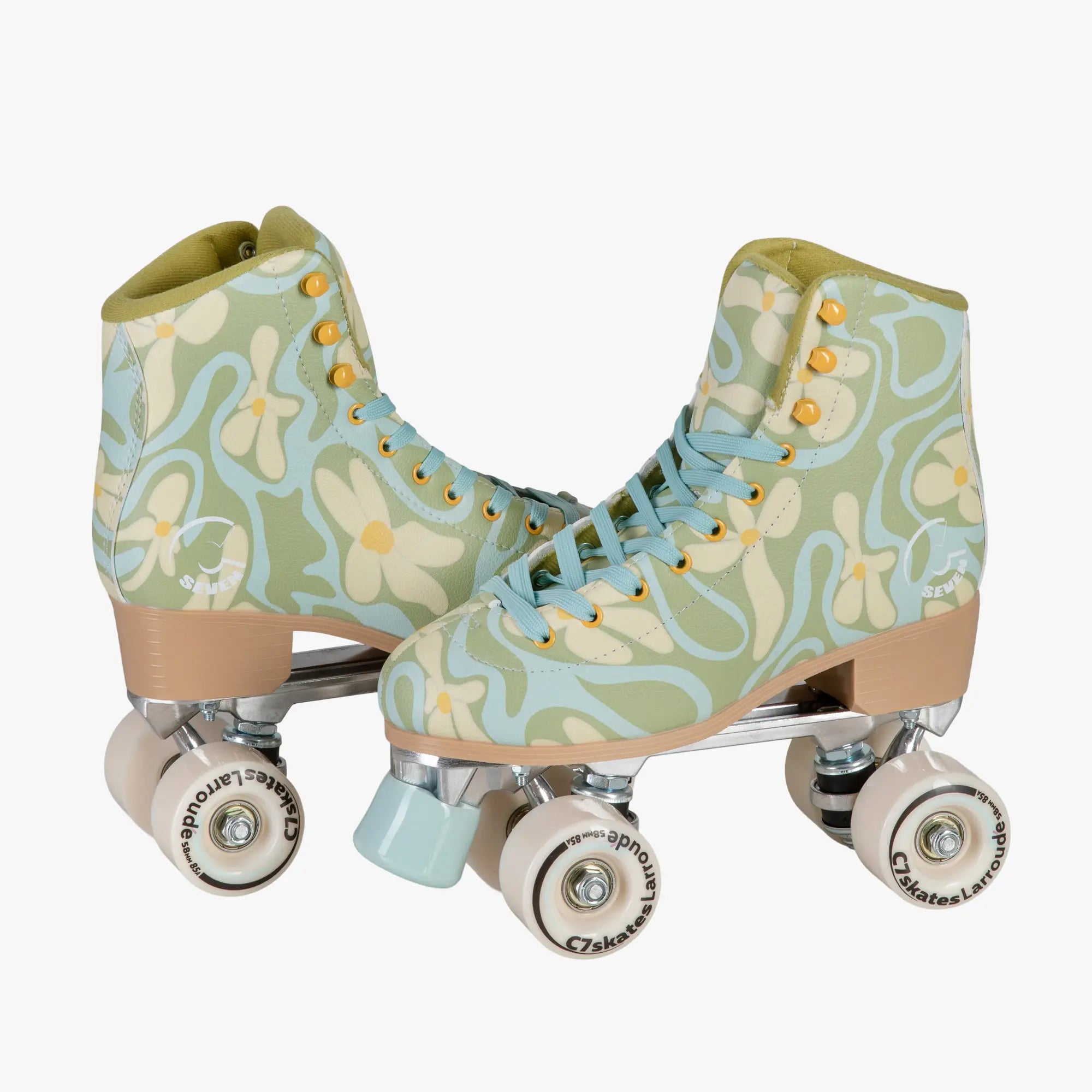 Pair of floral-patterned roller skates on a white background