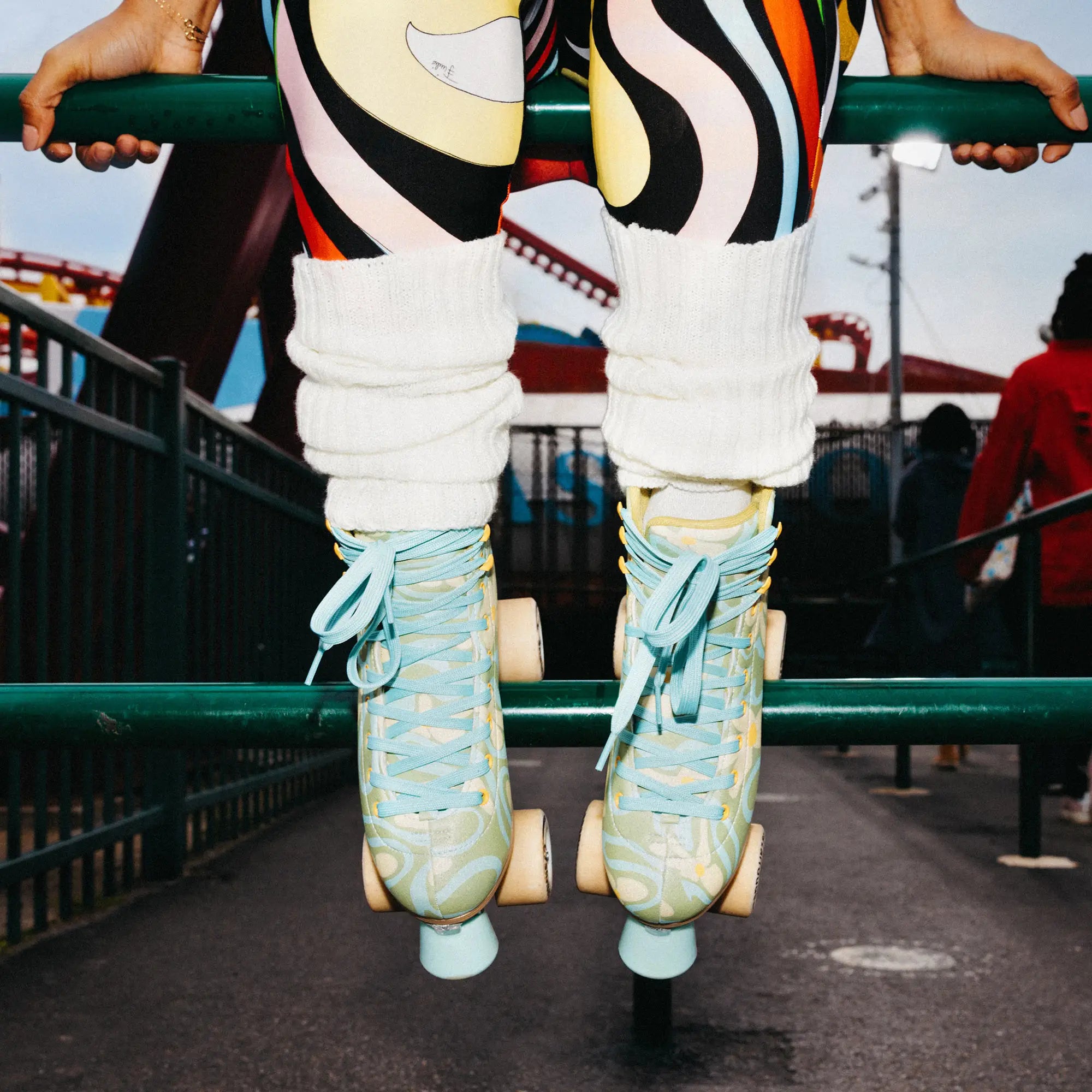 Person wearing colorful roller skates with a blurred background