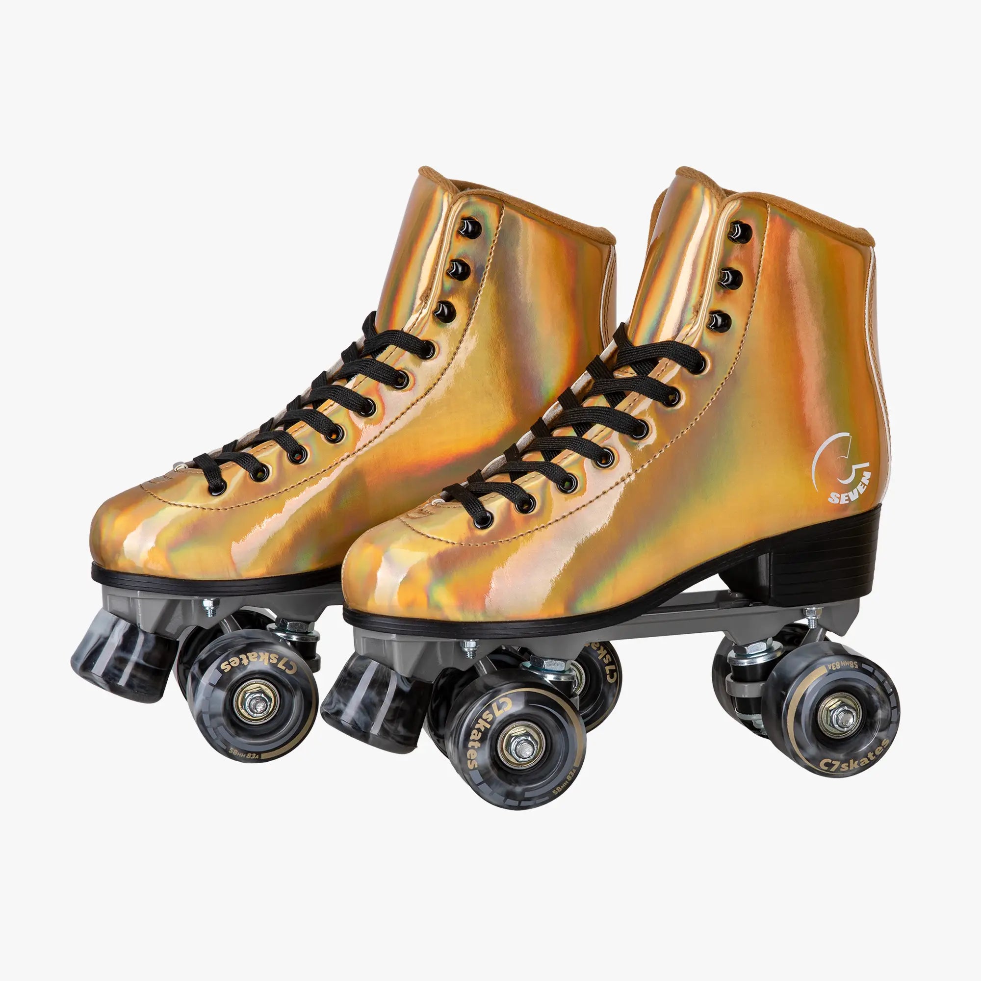 Pair of gold and black roller skates on a white background