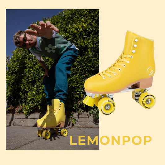 Person roller skating with yellow Lemonpop roller skates on a light background