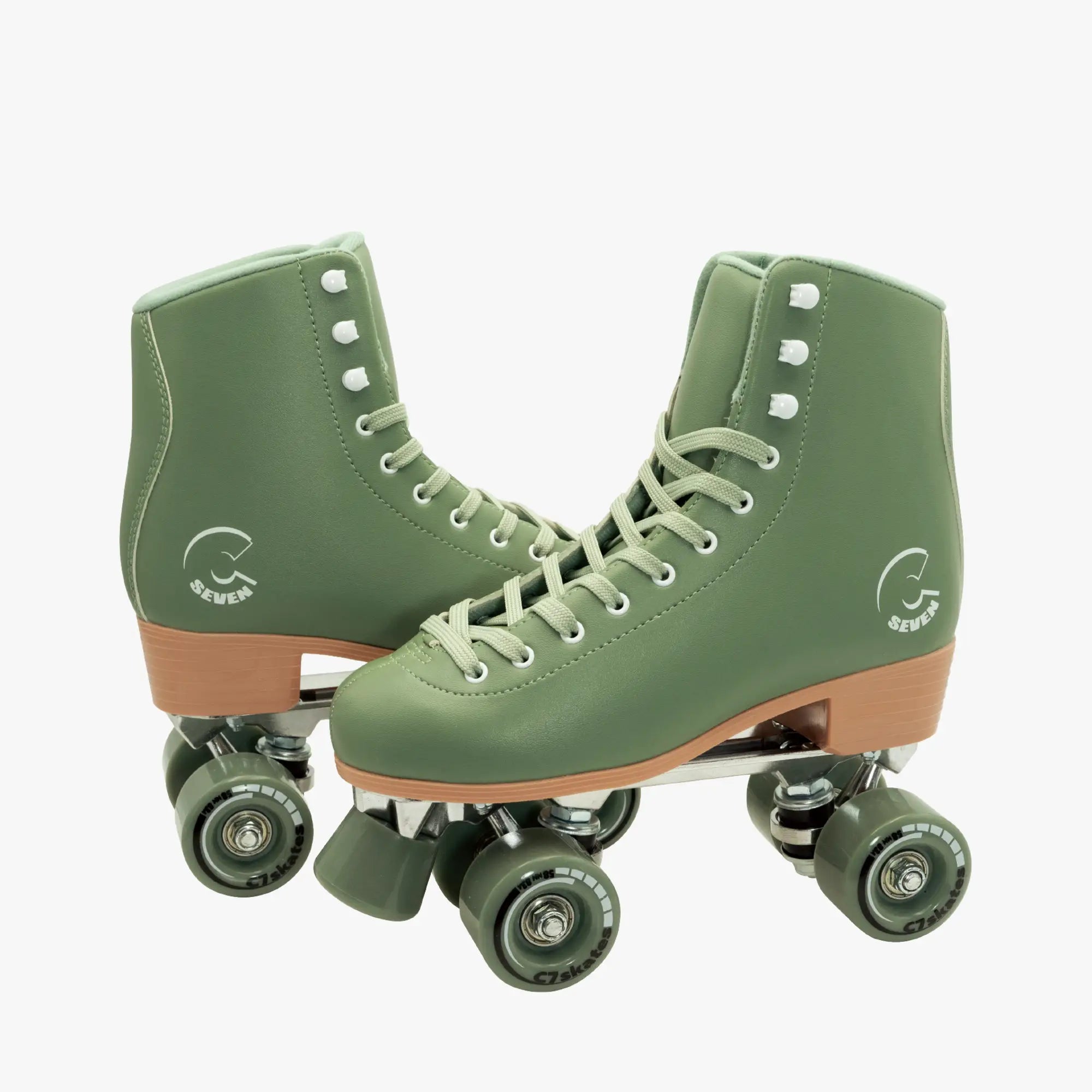 Green roller skates with brown accents featuring the brand 'C7Skates' on a white background