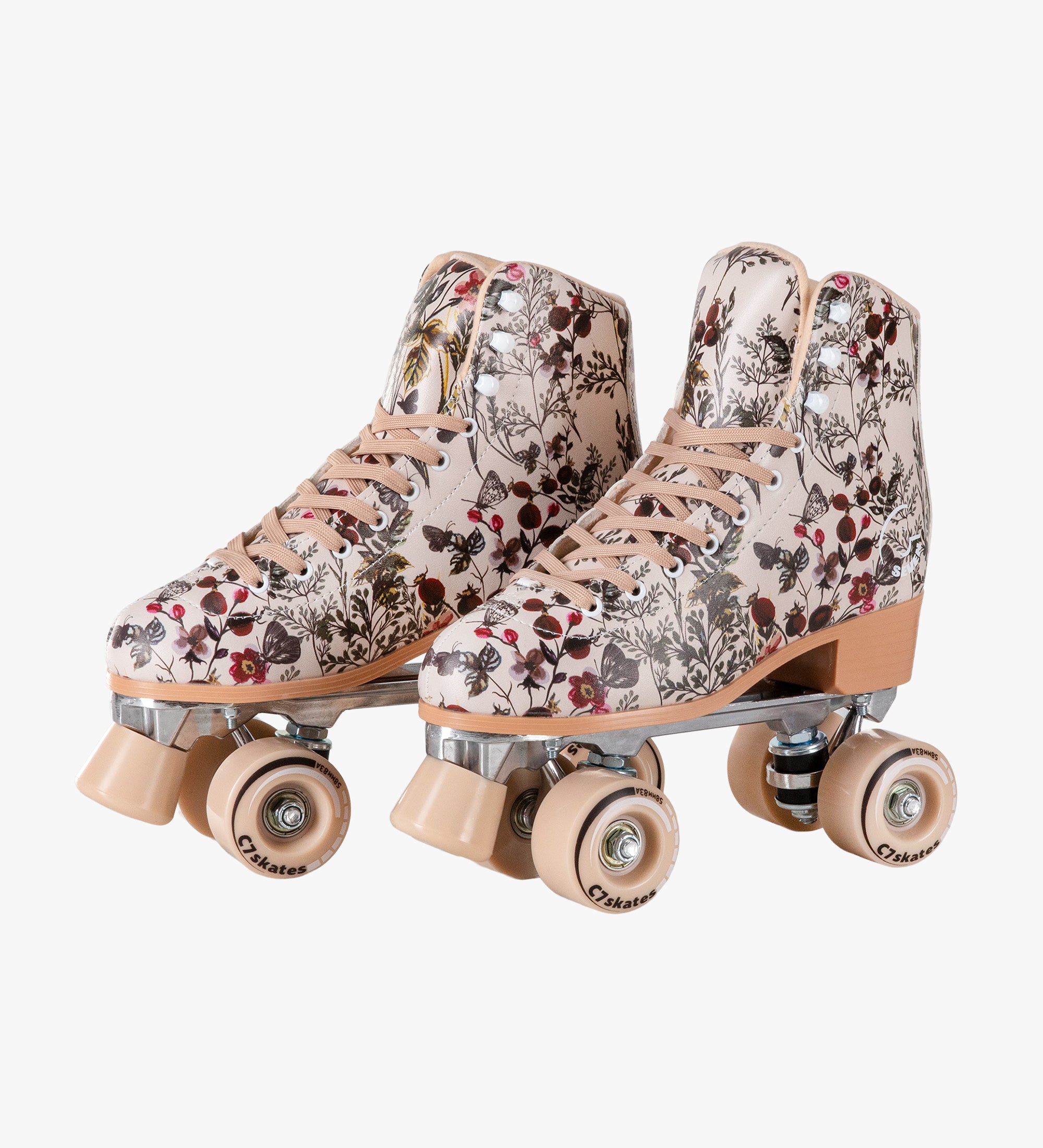 Floral-patterned roller skates on a white background
