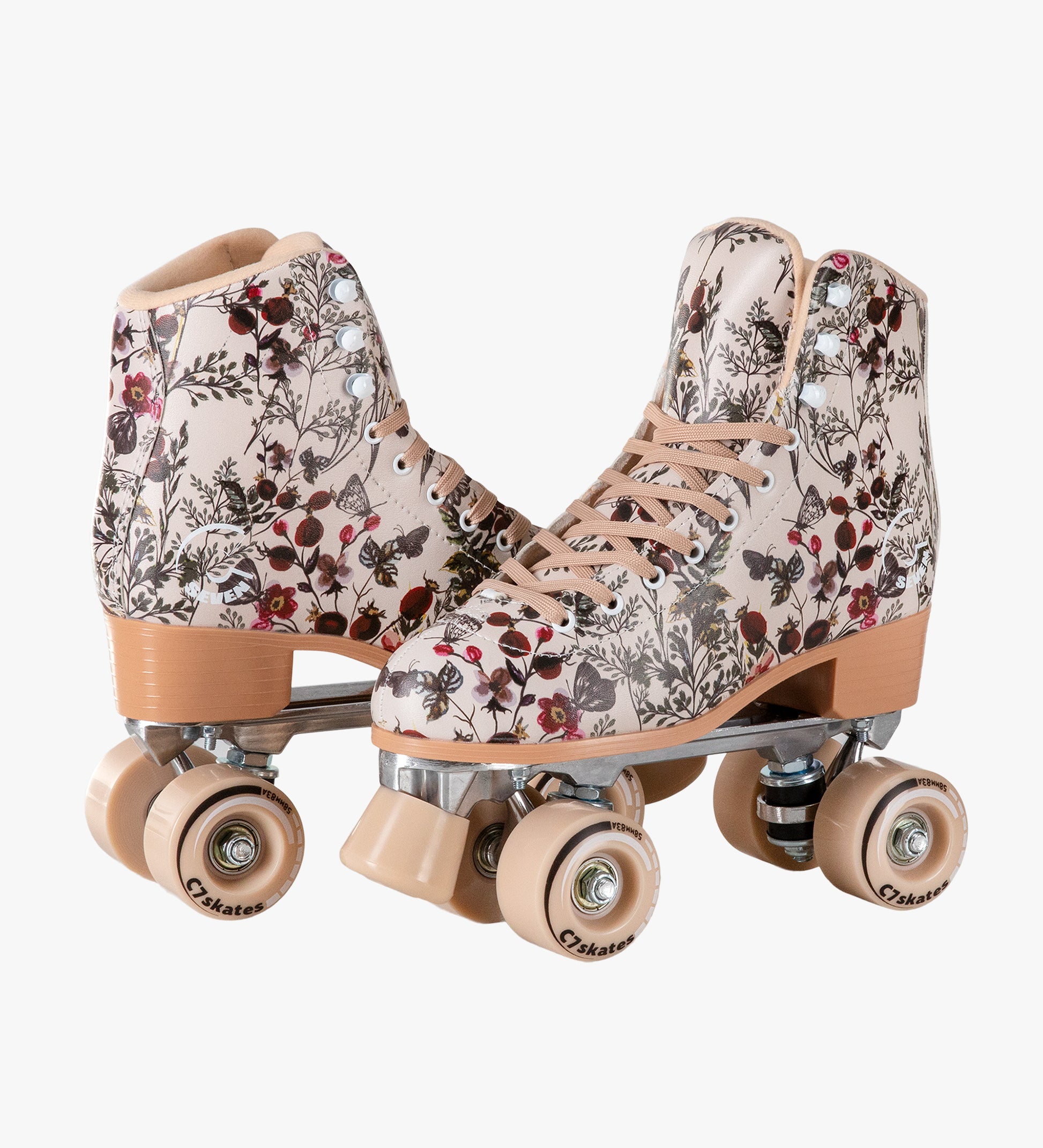 Pair of floral-patterned roller skates on a white background
