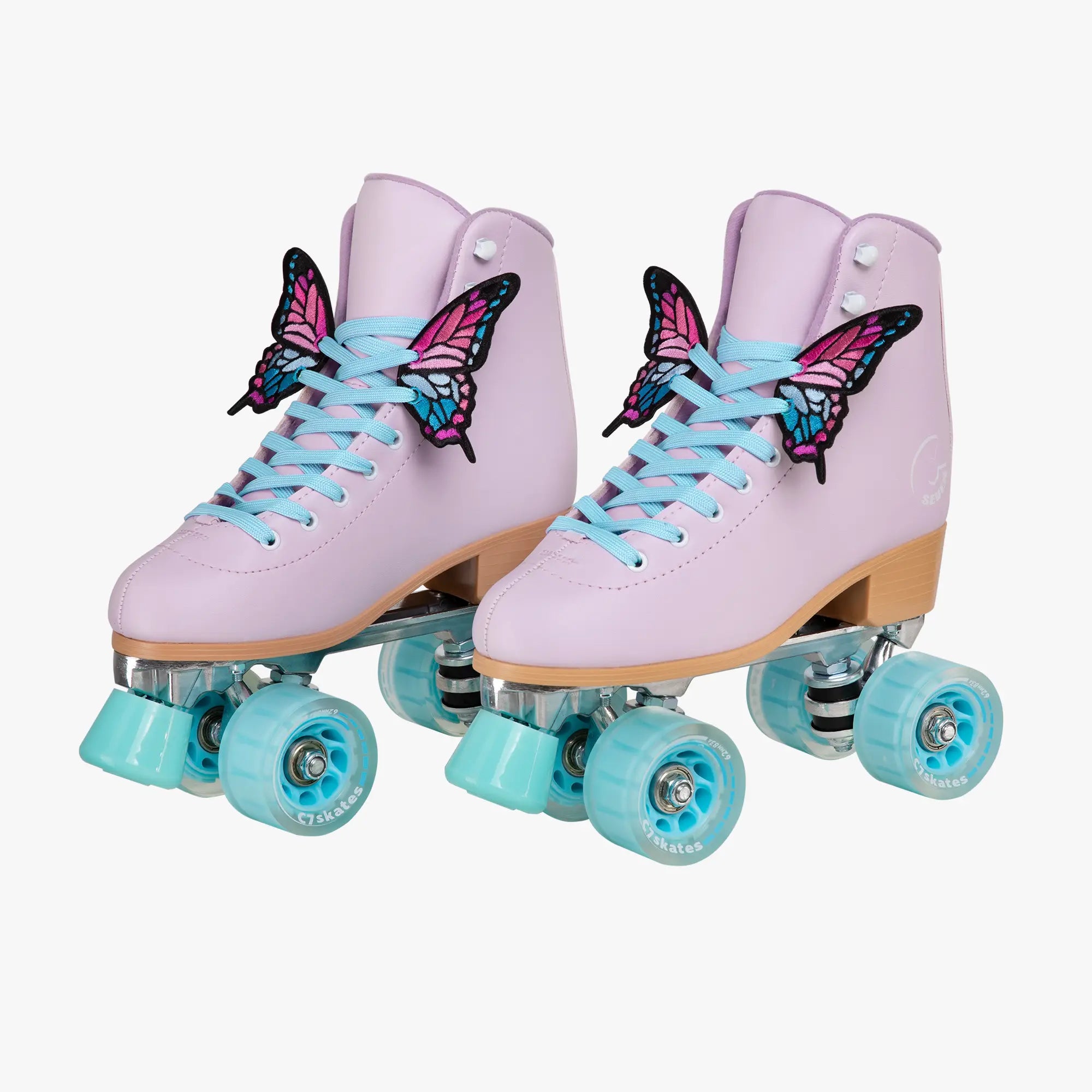 Pink roller skates with butterfly decorations and light blue wheels on a white background