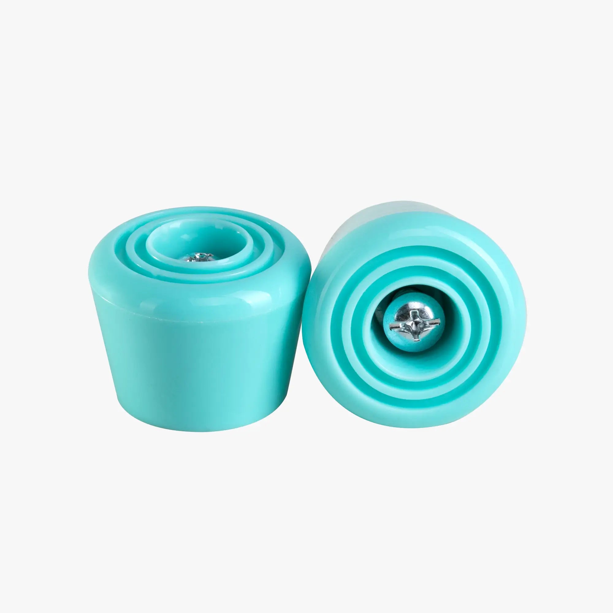 Two turquoise skateboard stoppers on a white background