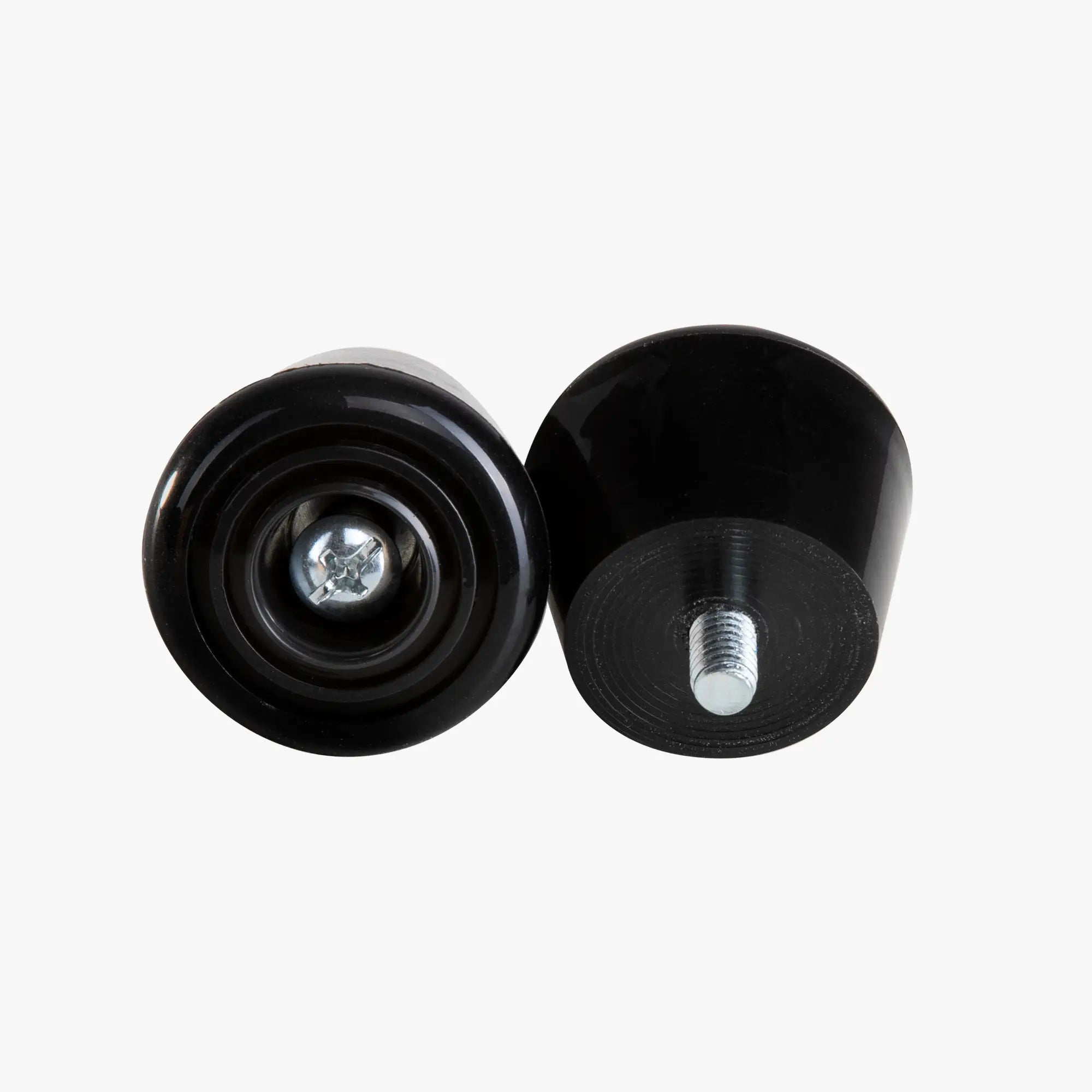 Two black stoppers on a white background