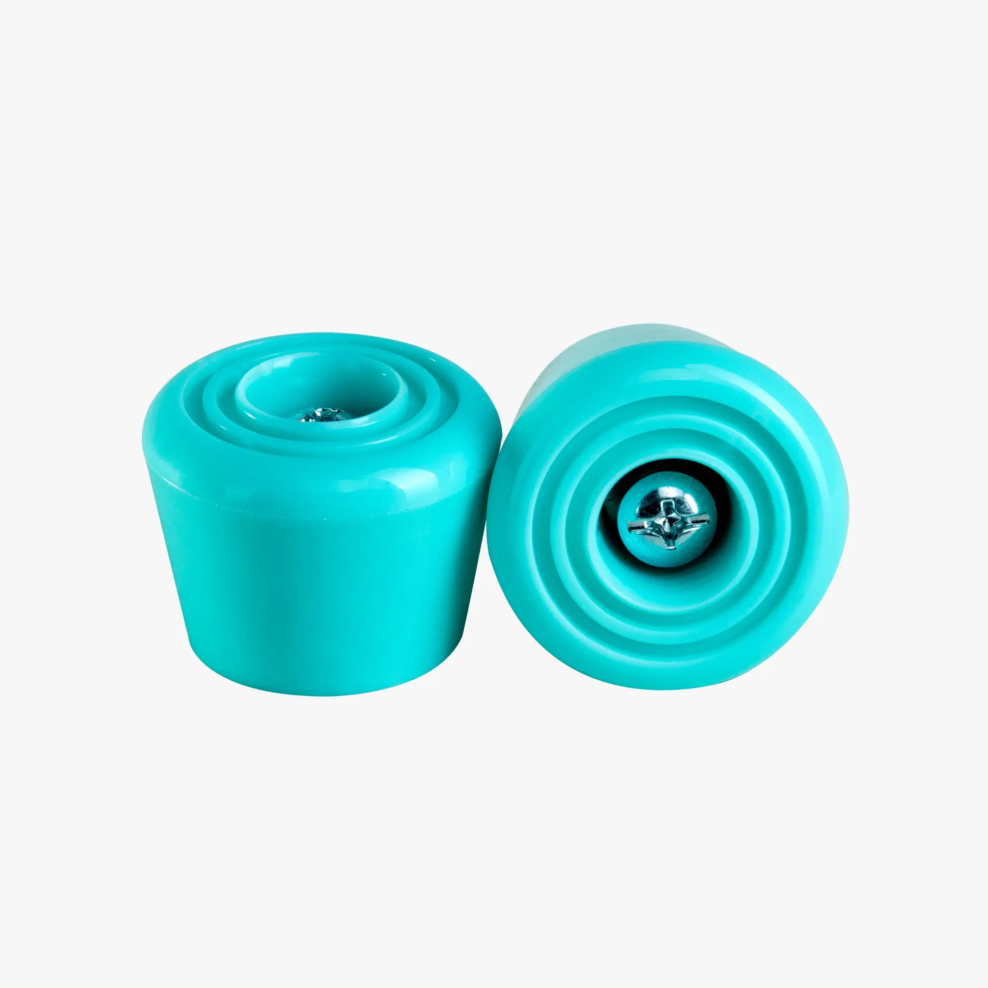 Two turquoise stoppers on a white background