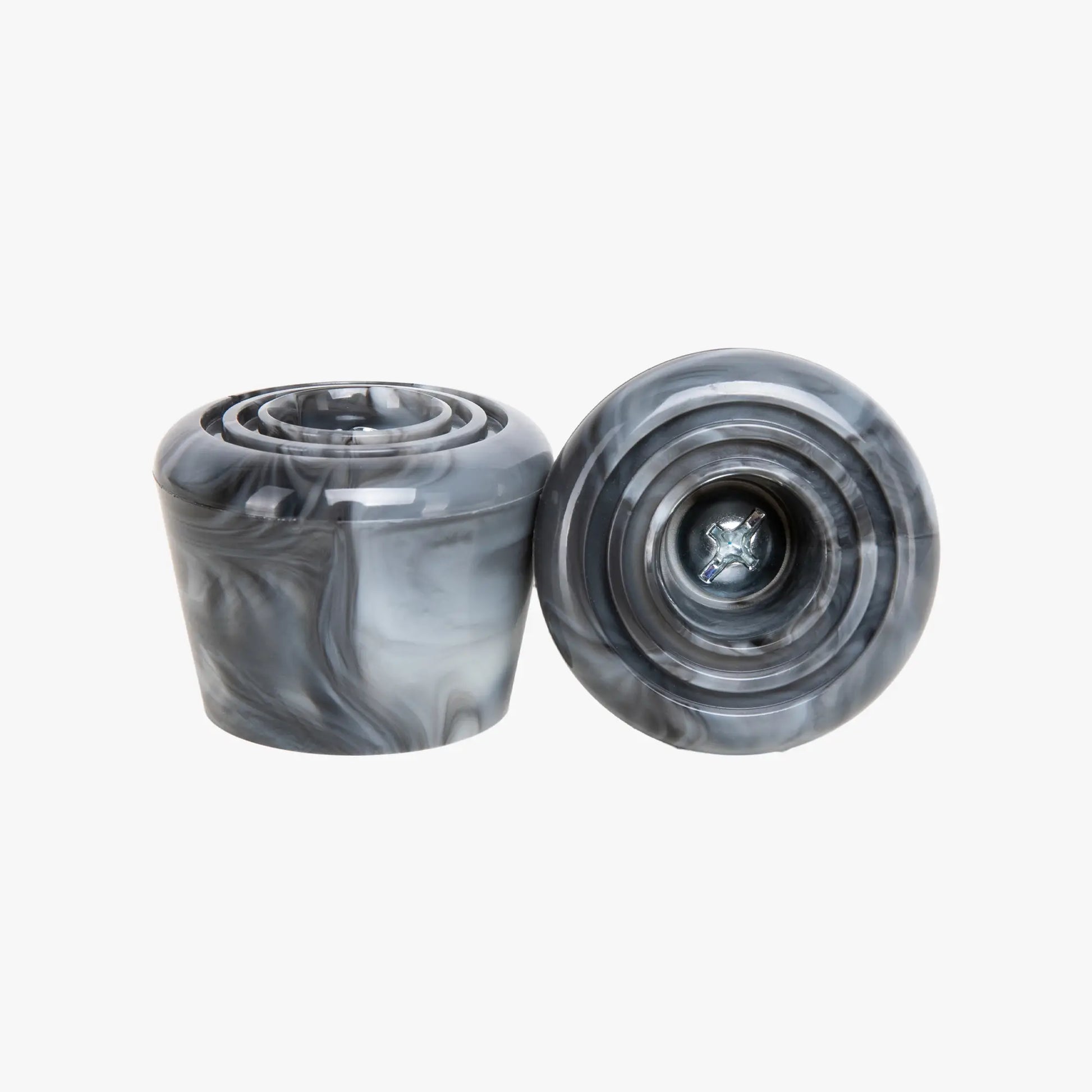 Two gray marbled stoppers on a white background