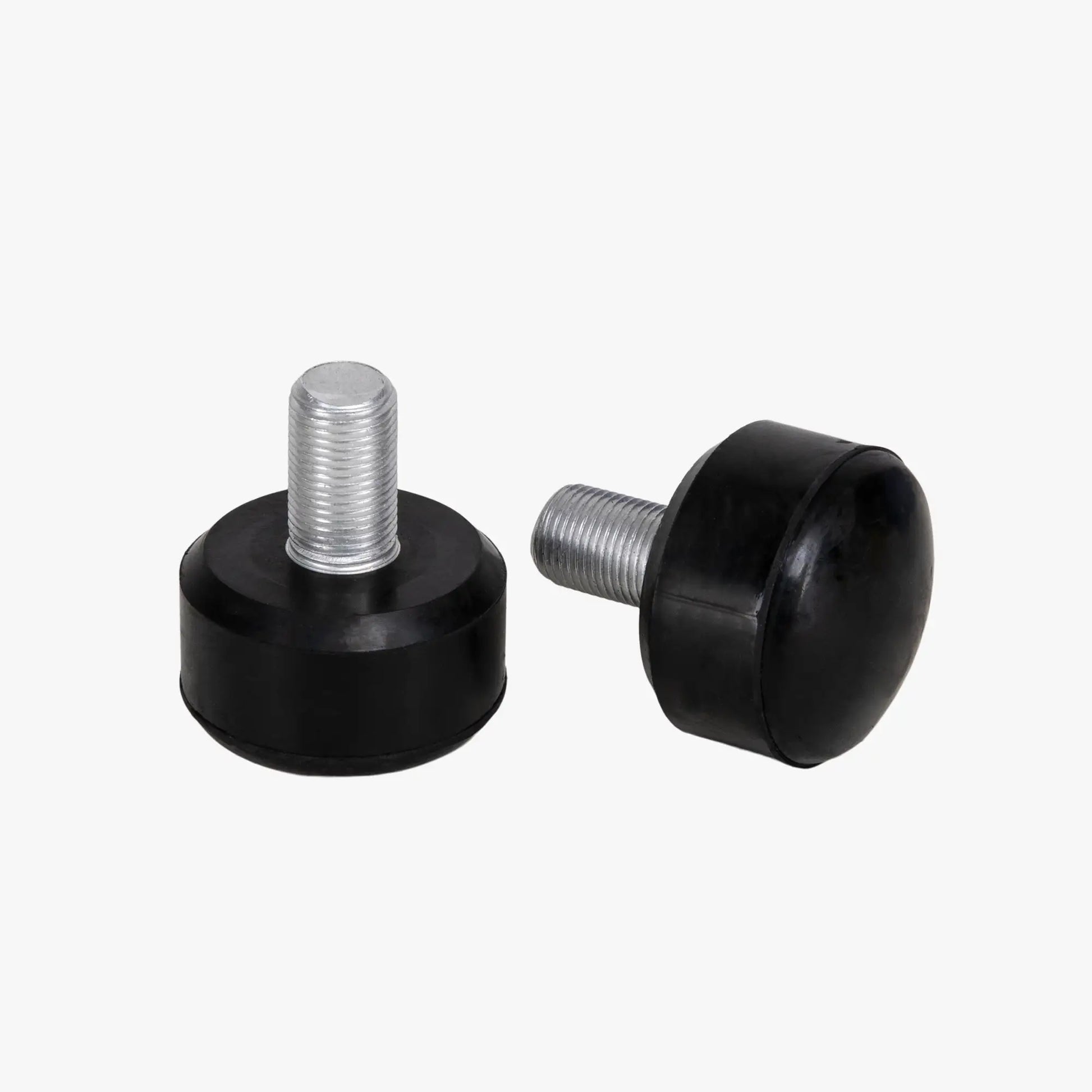 Two black rubber bumper feet with metal screws on a white background