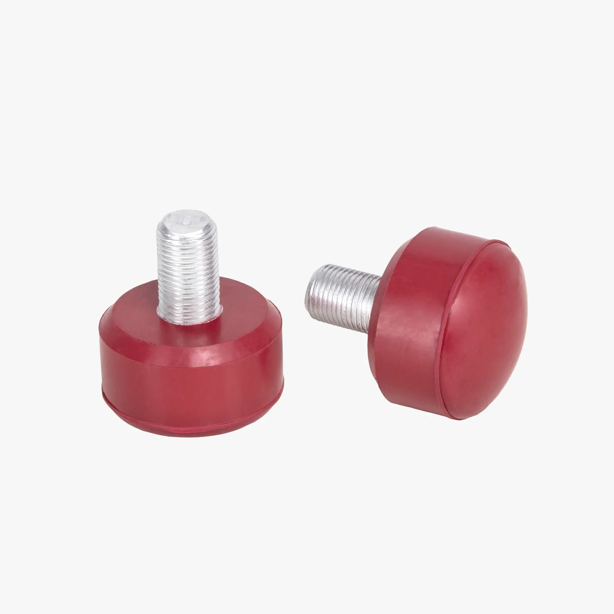 Two red stoppers on a white background