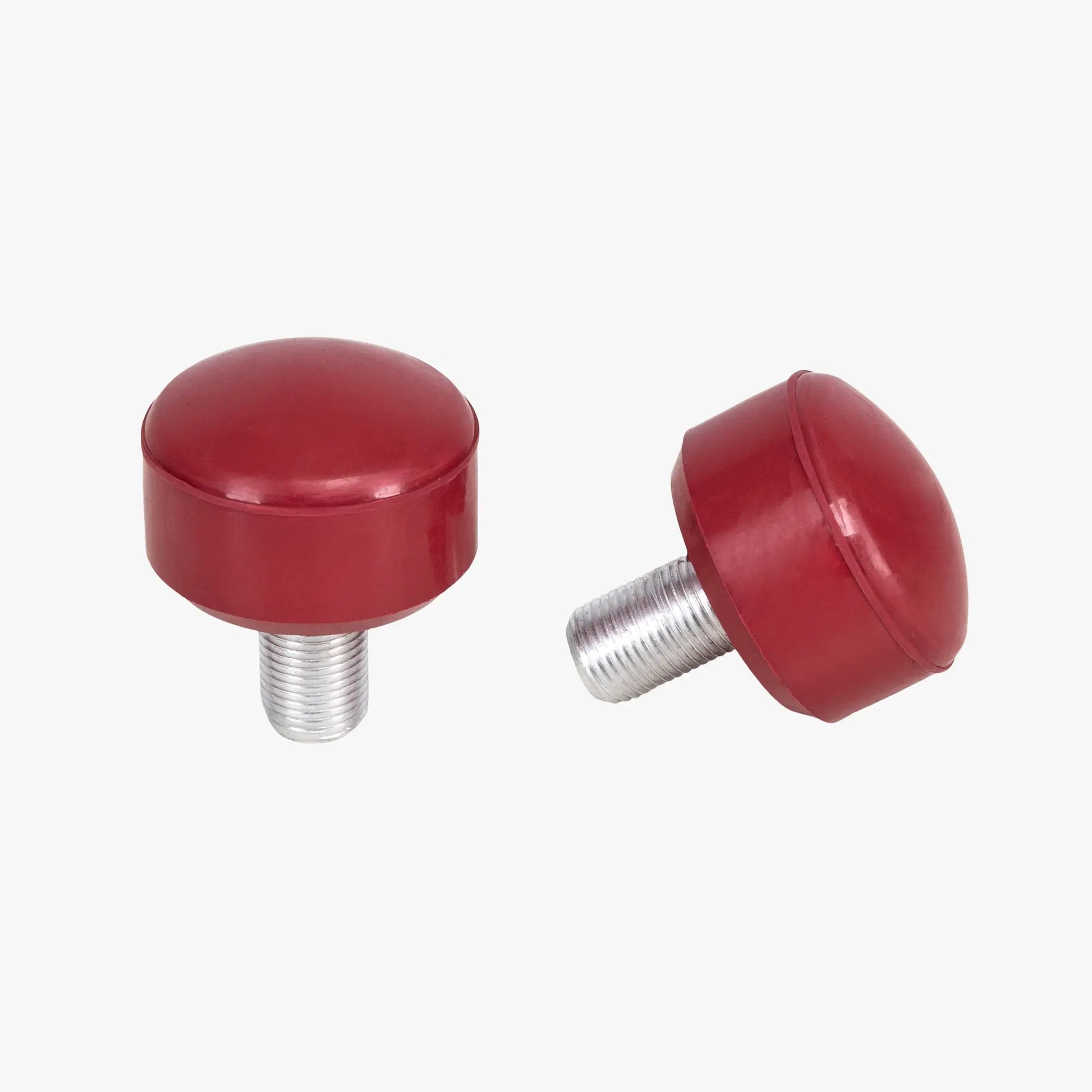 Two red stoppers on a white background