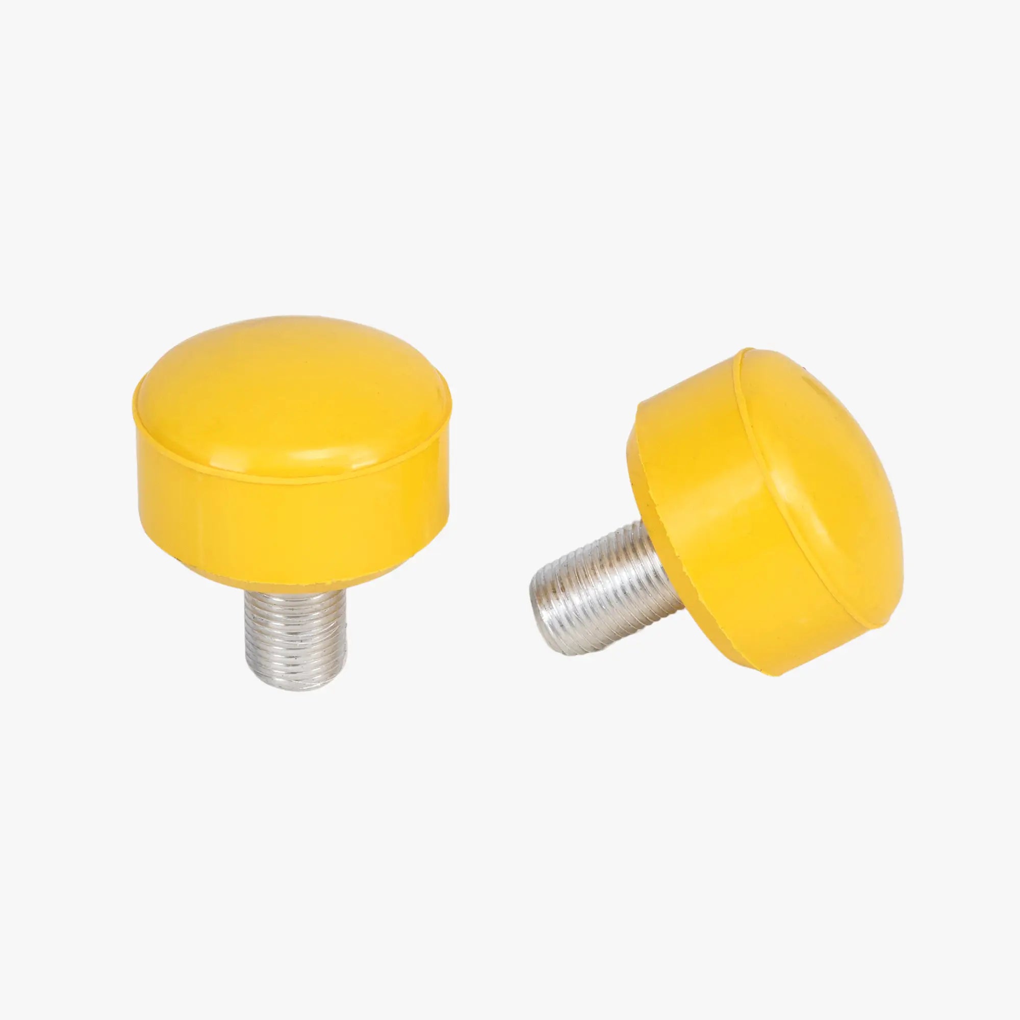 Two yellow knobs with threaded metal stems on a white background
