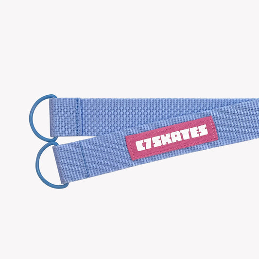 Blue strap with a pink label on a white background featuring the brand 'C7Skates'.
