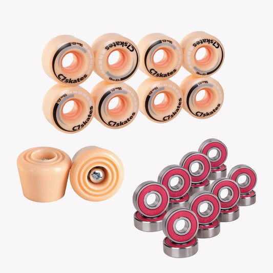 Set of c7 Roller Peachy skate bearings and wheels on a white background