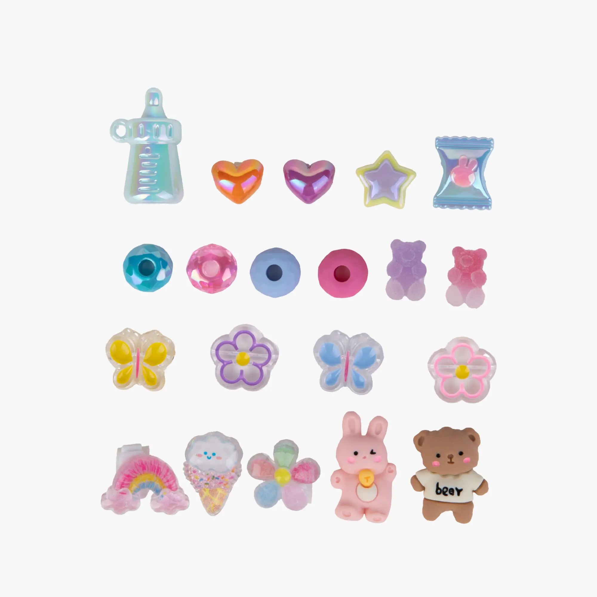 Collection of colorful miniature toys on a white background