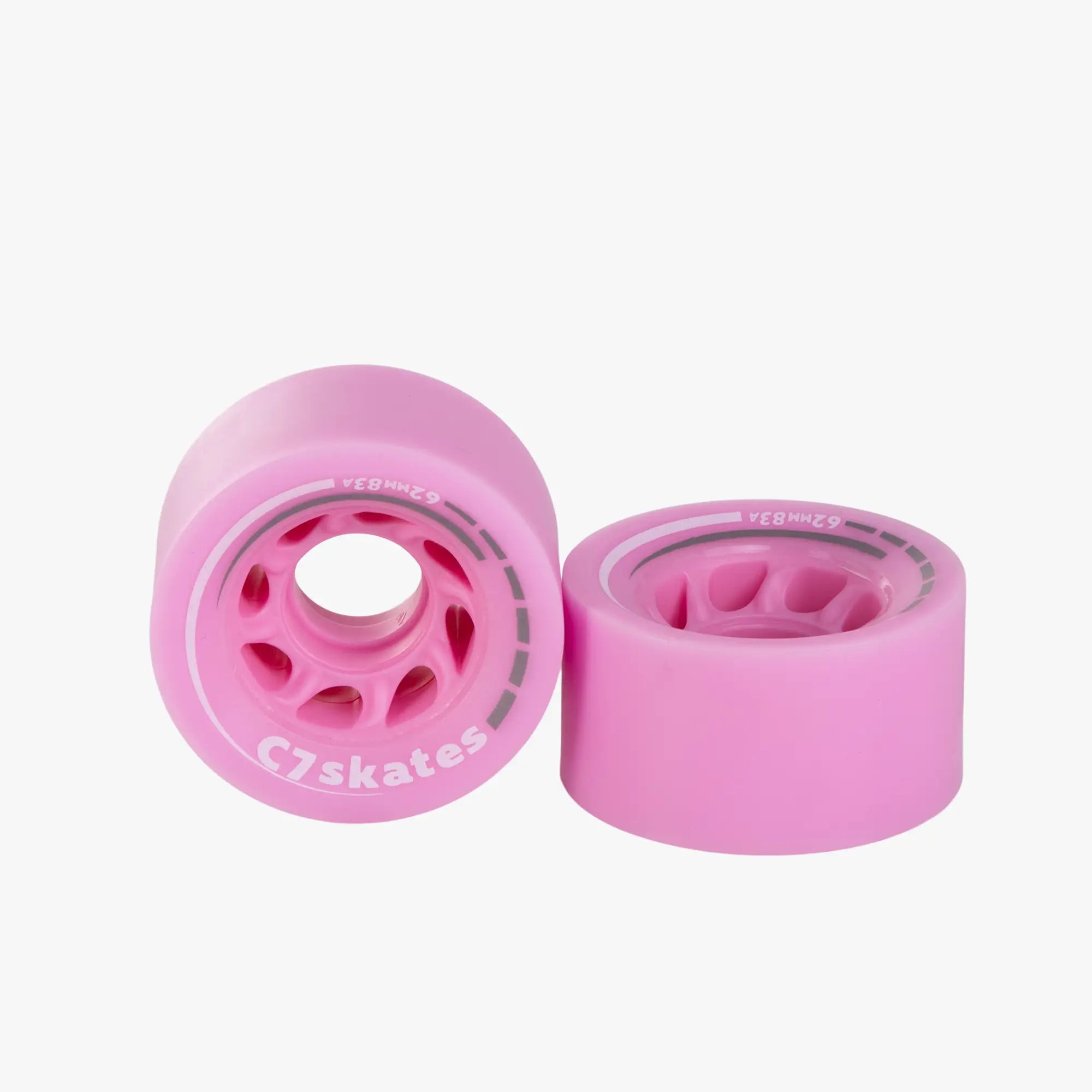 Two pink roller skate wheels with 'C7skates' branding on a white background