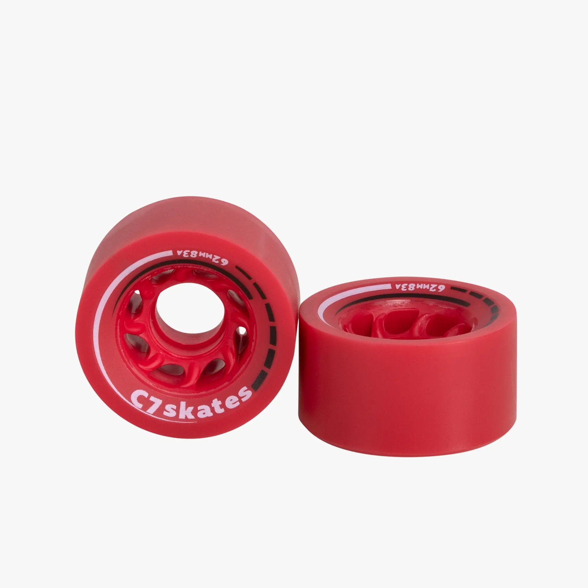 Two red skateboard wheels with 'C7 Skates' branding on a white background