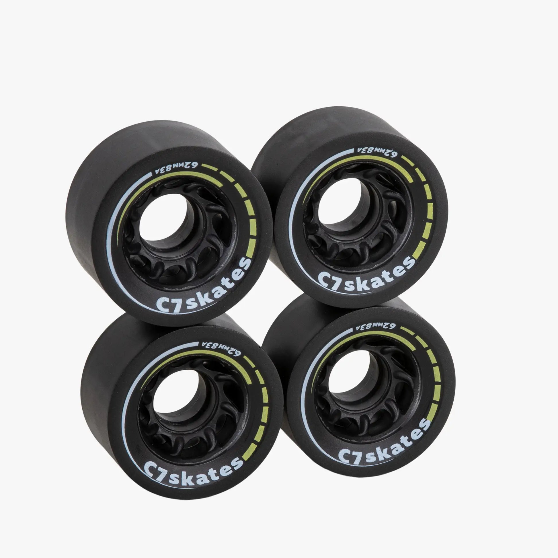 Four black C7skates wheels on a white background